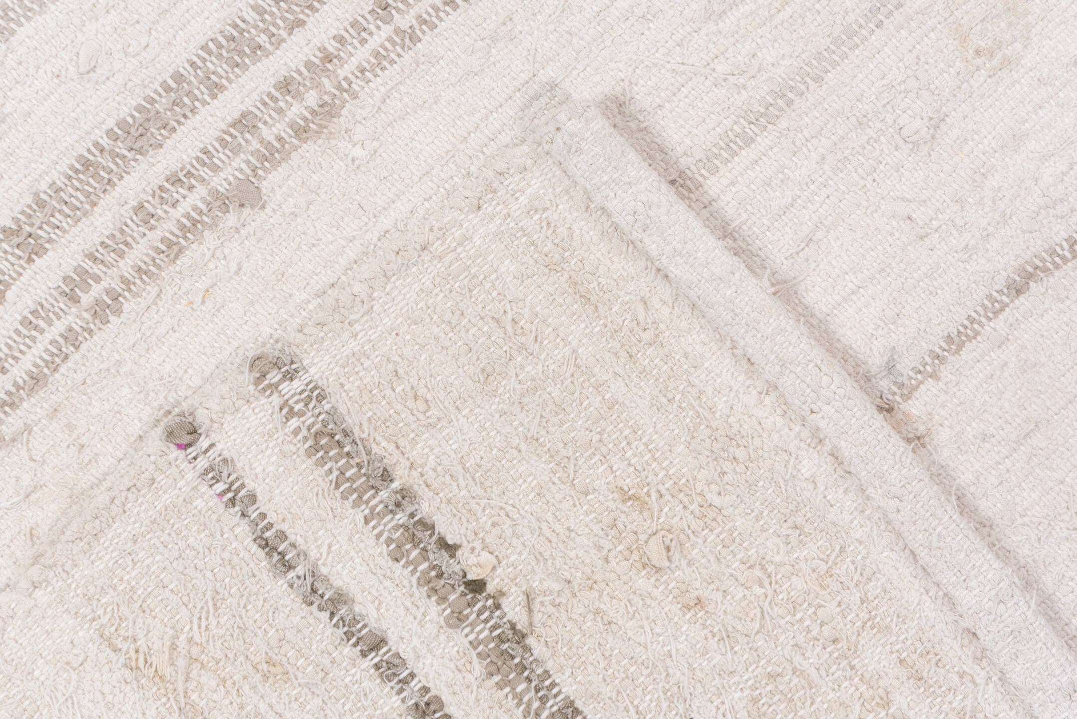 6' x 7' one-of-a-kind handmade antique Rag Rug rug. Color palette: ivory, cream, charcoal, slate, faded blue, taupe, gray