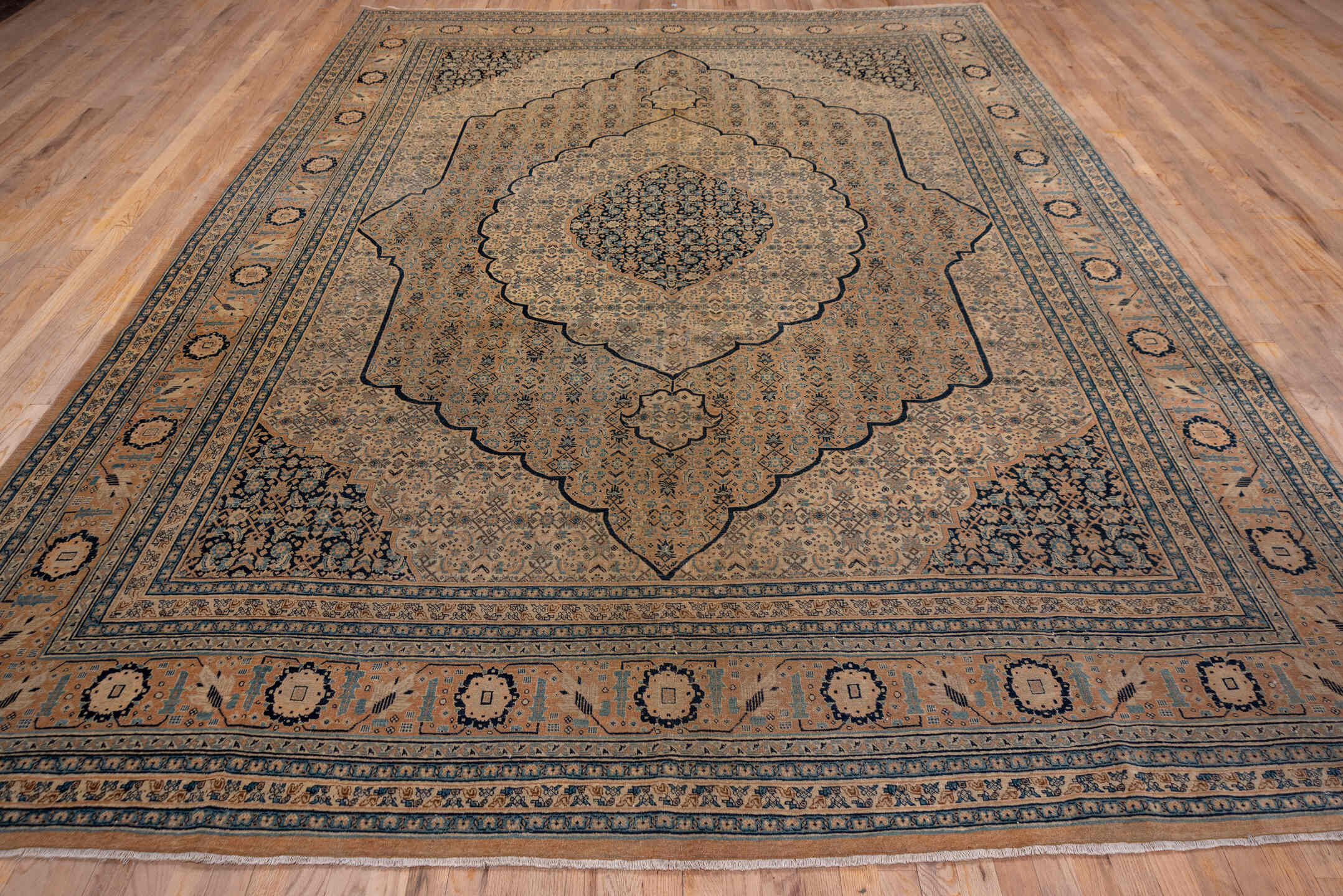 9' x 12' one-of-a-kind handmade antique Tabriz large size rug. Color palette: camel, ivory, navy, taupe, slate, sand, beige
