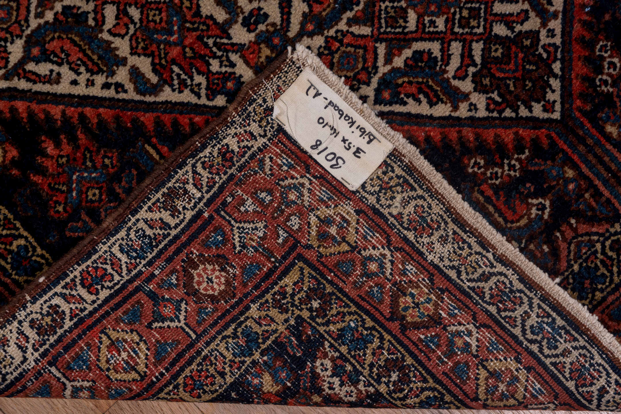 3' x 14' one-of-a-kind handmade antique Bibikabad runner rug. Color palette: ivory, navy, rust, terracotta, camel, burgundy