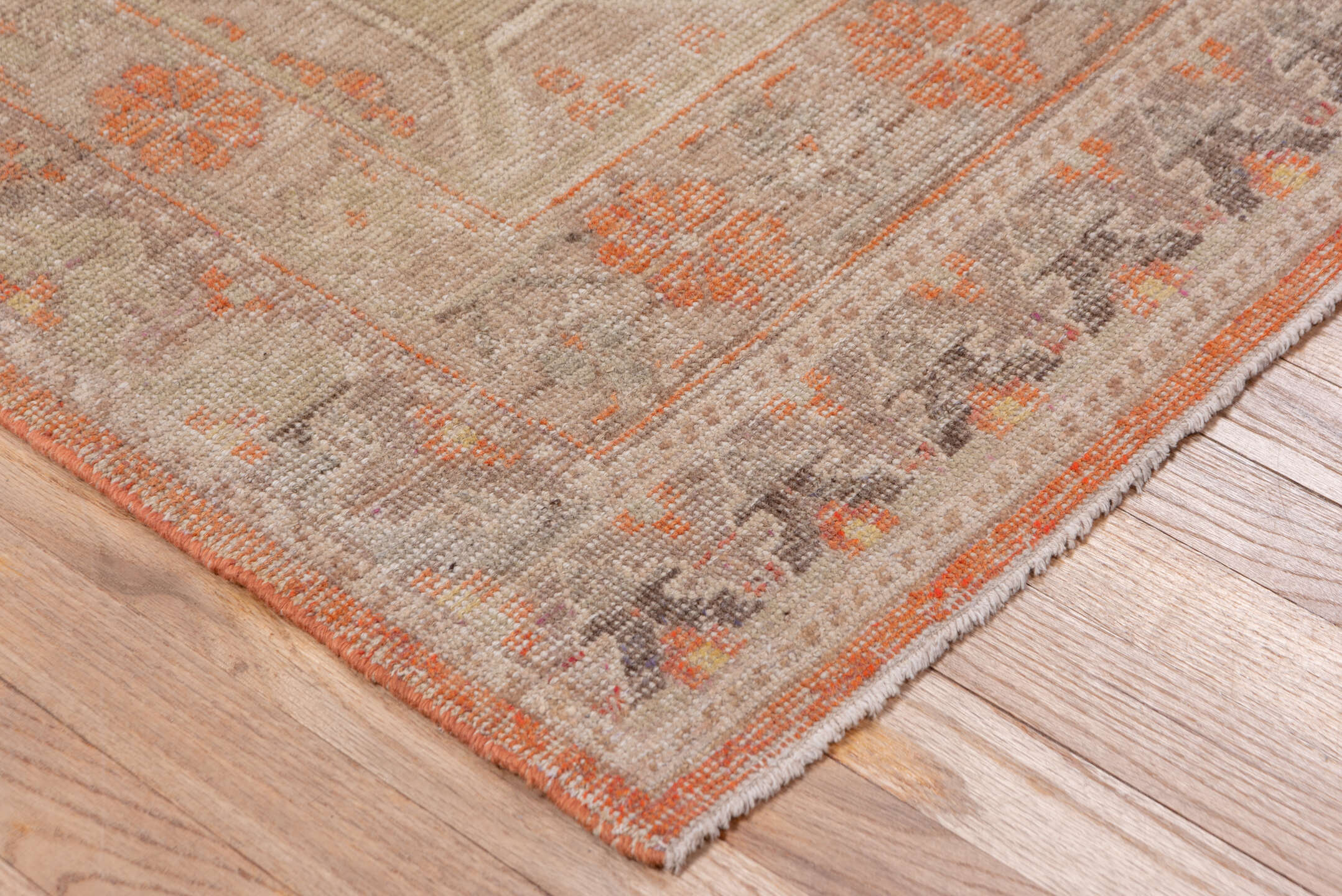 4' x 7' one-of-a-kind handmade antique Khotan rug. Color palette: taupe, coral, ivory, pewter, rose, camel, beige, gray