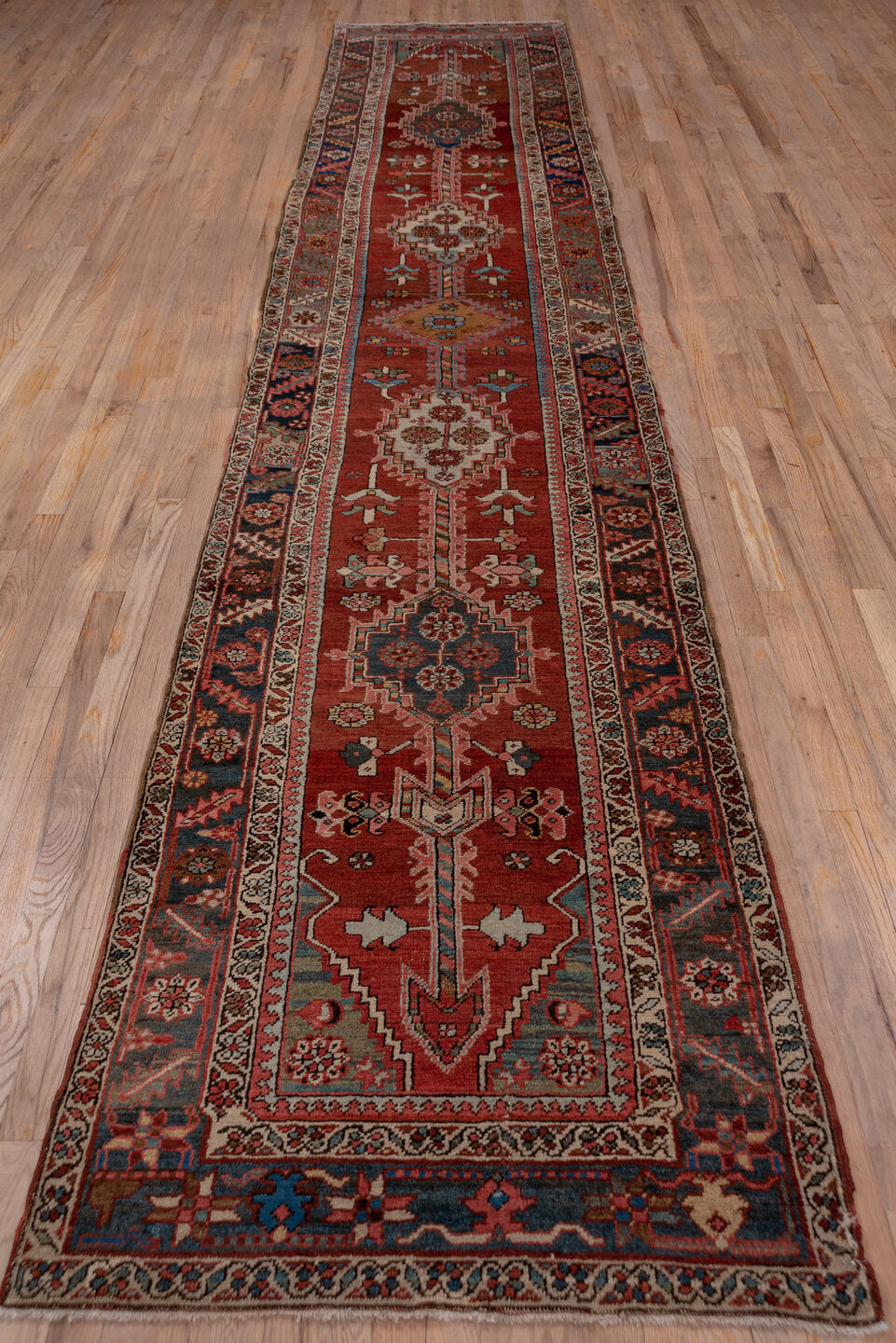 3' x 15' one-of-a-kind handmade vintage Serapi runner rug. Color palette: brown, dim gray, gray, off-white, pink, red, snow