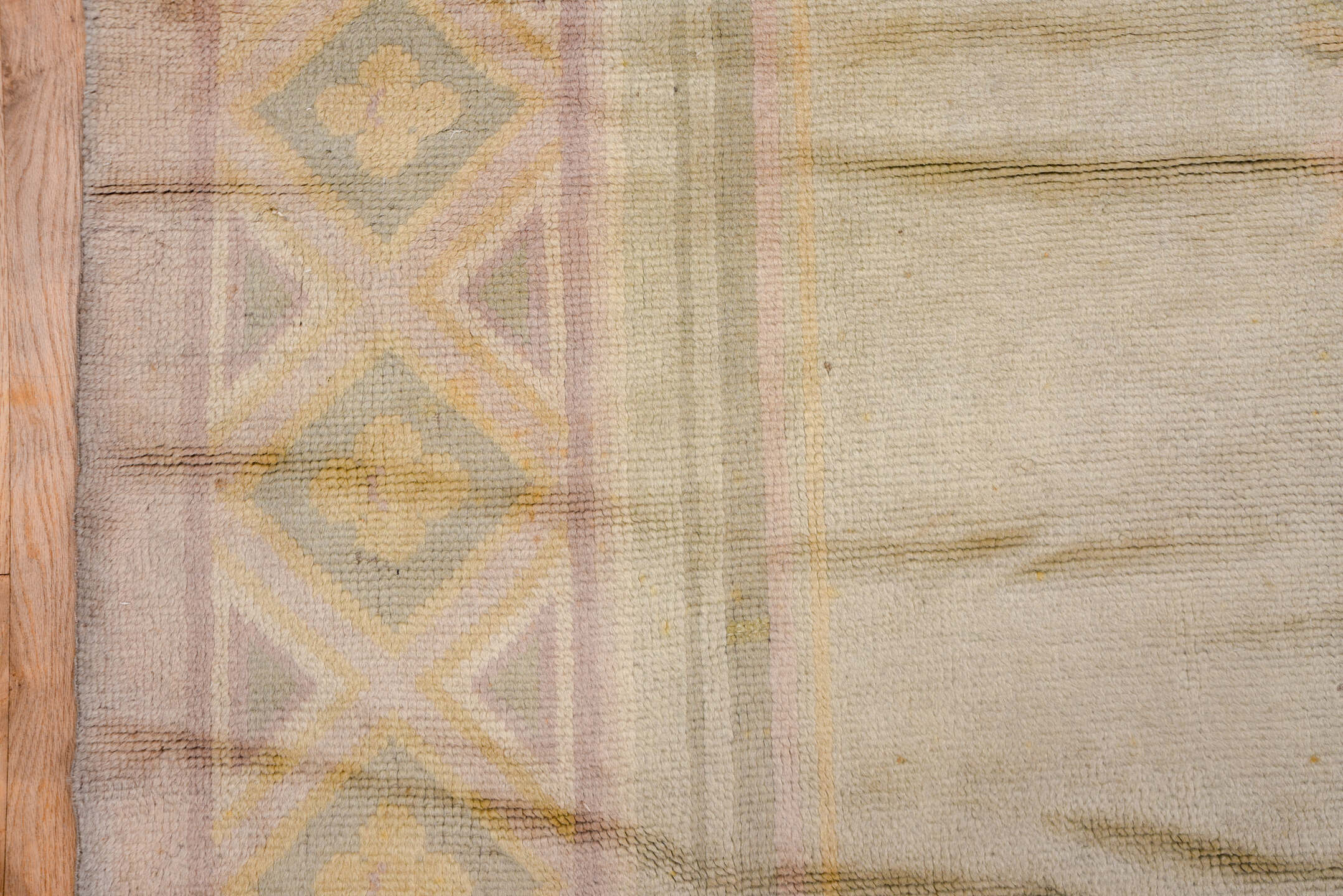 14' x 16' one-of-a-kind handmade vintage Savonnerie oversize rug. Color palette: ivory, blush, taupe, gold, sage, rose