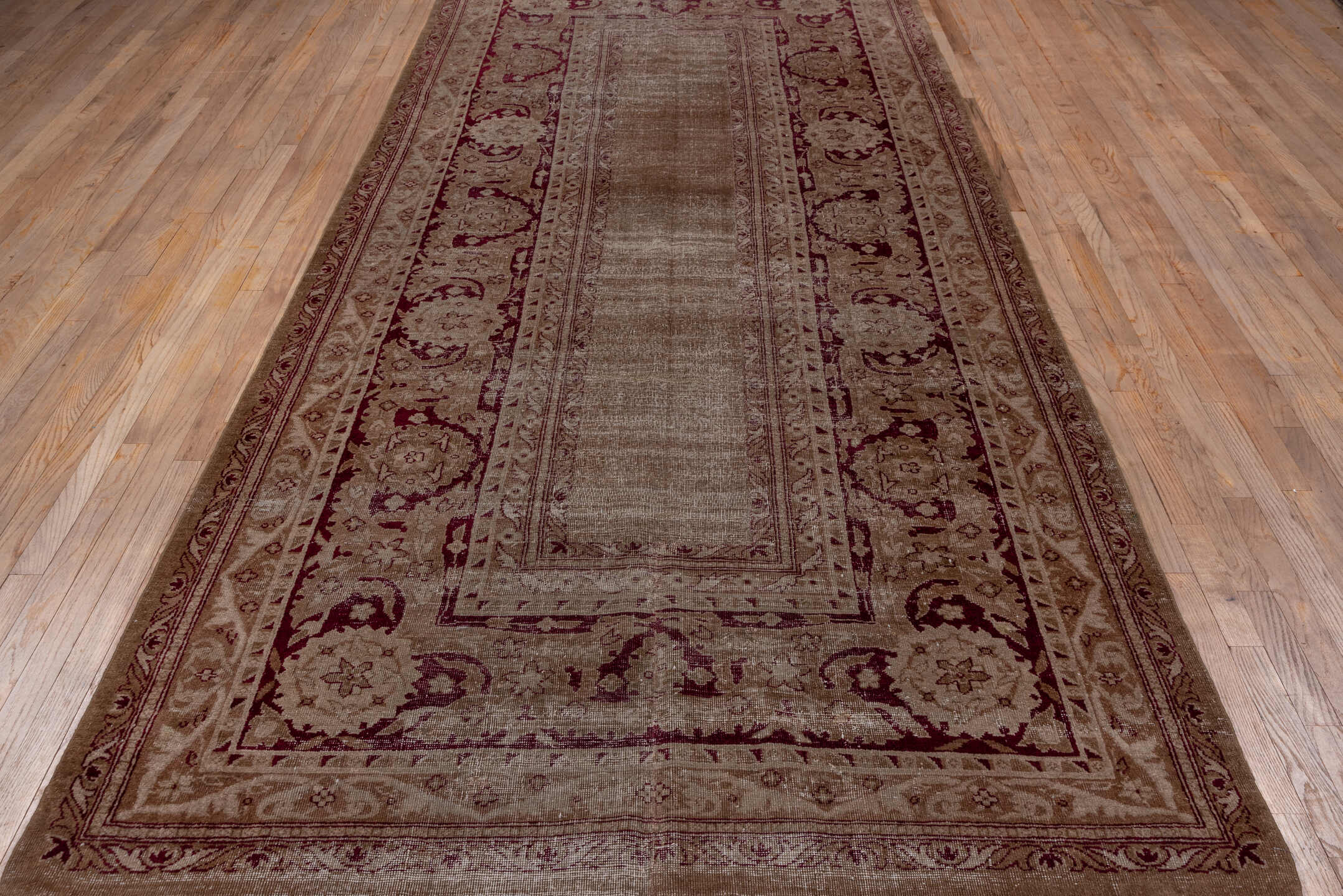 5' x 12' one-of-a-kind handmade antique Agra rug. Color palette: taupe, beige, burgundy, rose, brown, gray, pink, red