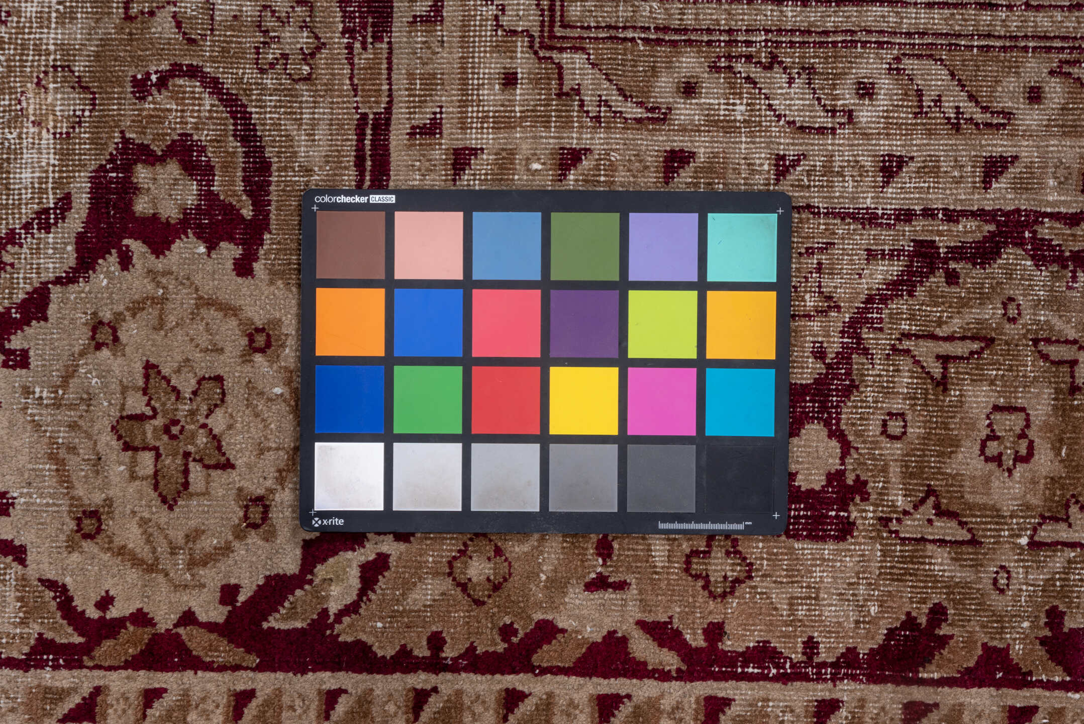 5' x 12' one-of-a-kind handmade vintage Agra rug. Color palette: brown, gray, pink, redwood