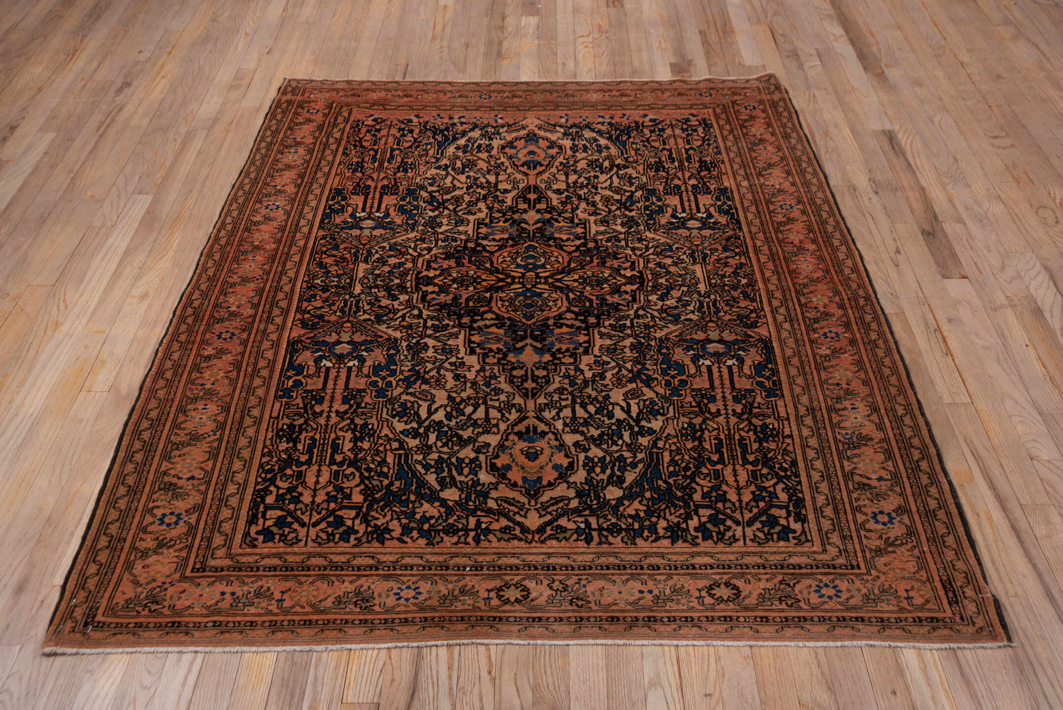 5' x 6' one-of-a-kind handmade vintage Malayer rug. Color palette: terra cotta, navy, ivory, rust, camel, slate, charcoal