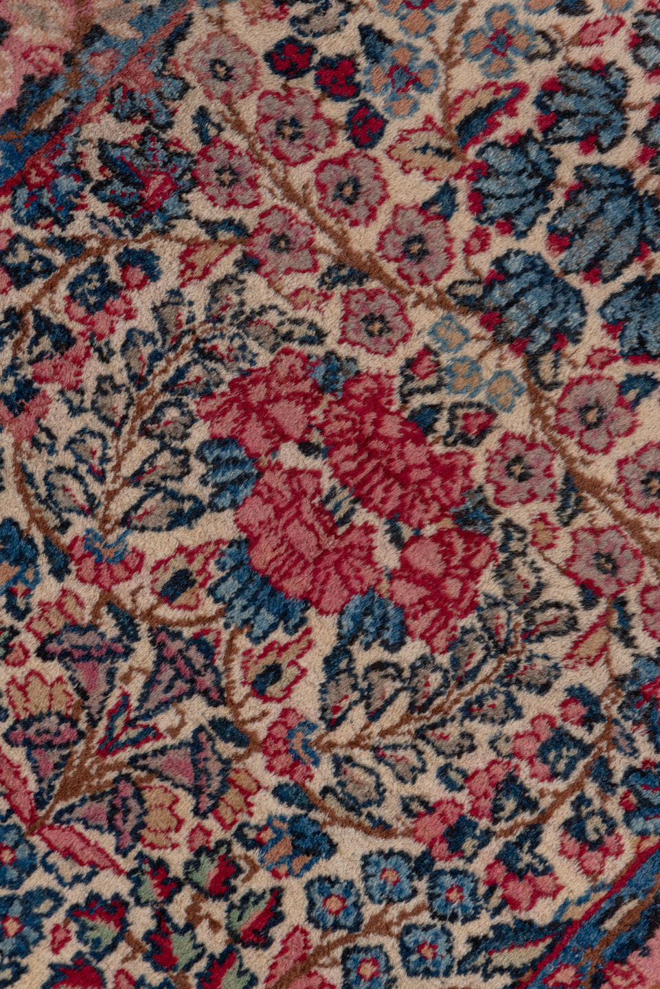 2' x 10' one-of-a-kind handmade antique Kerman runner rug. Color palette: ivory, navy, rose, dusty pink, rust, taupe