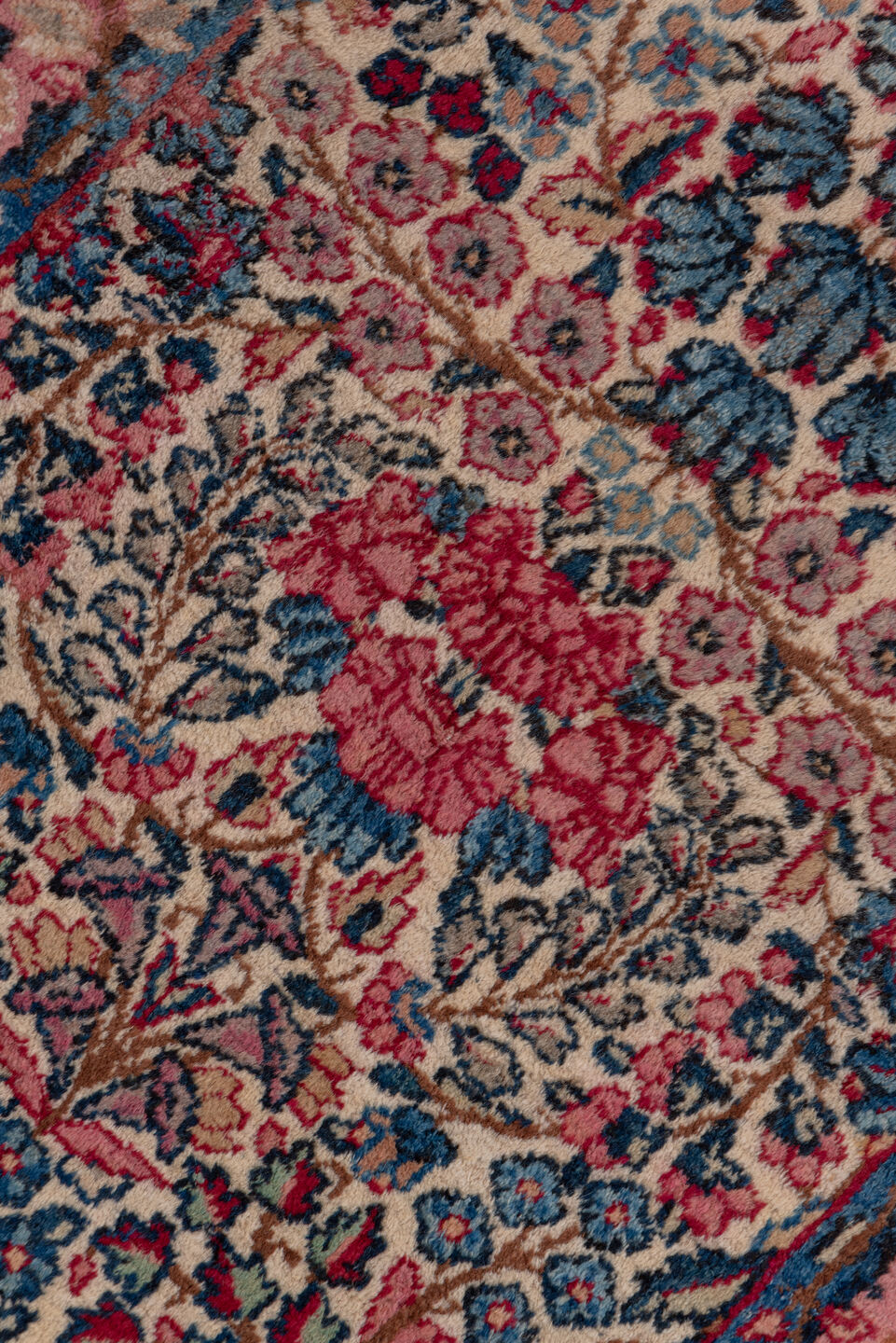 2' x 10' one-of-a-kind handmade antique Kerman runner rug. Color palette: ivory, navy, rose, dusty pink, rust, taupe