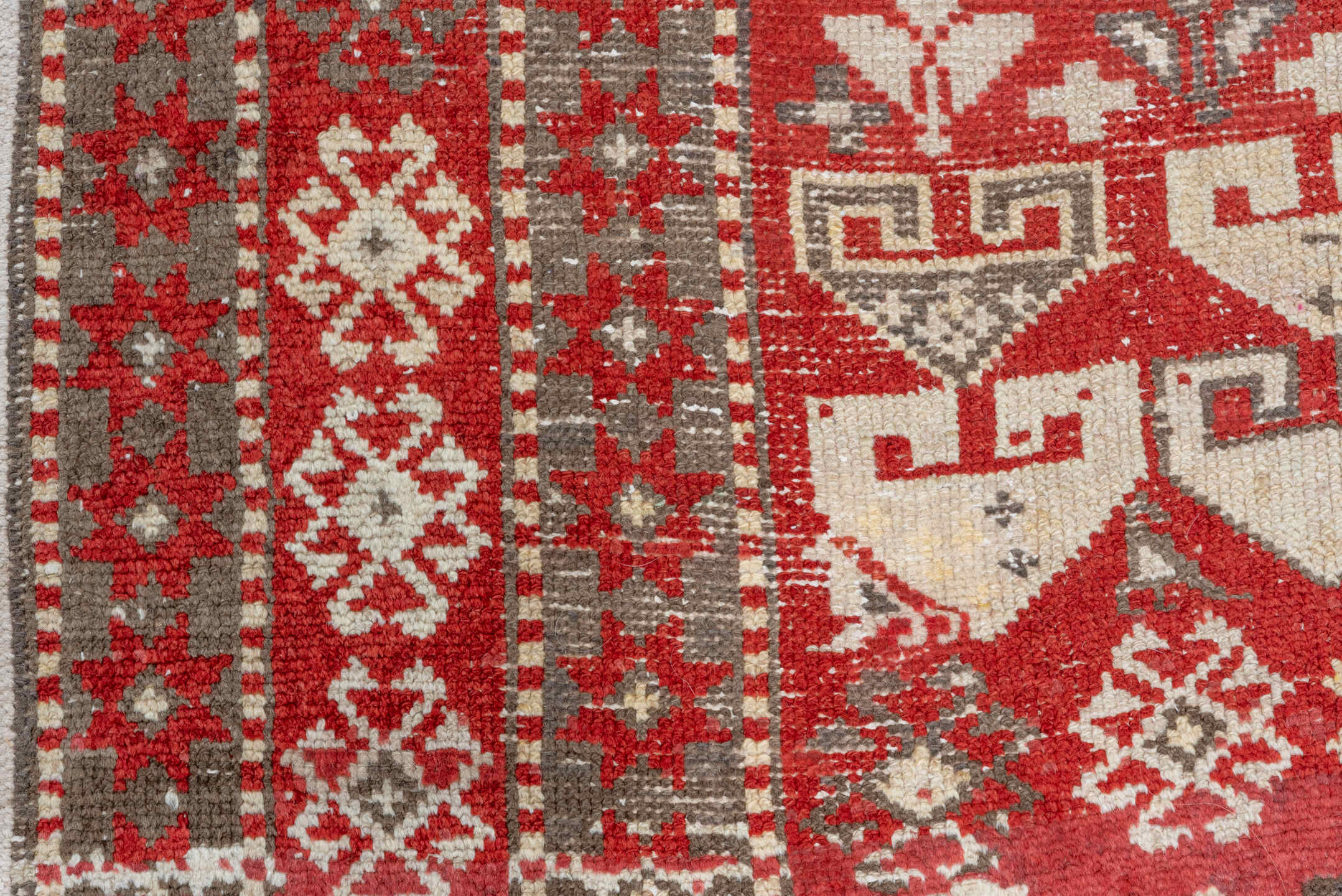 4' x 13' one-of-a-kind handmade antique Caucasian runner rug. Color palette: red, ivory, charcoal, taupe, sage, gray, black