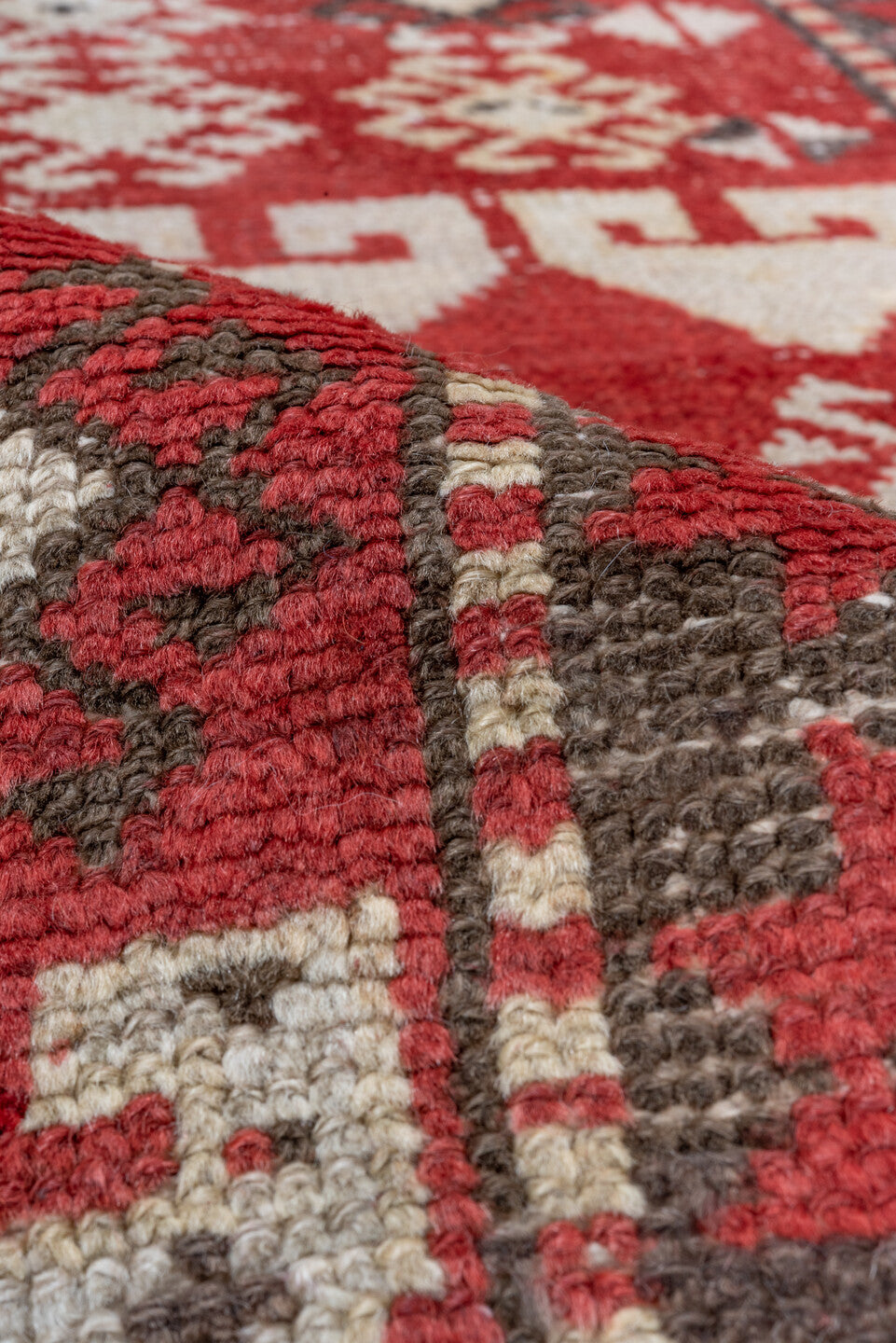 4' x 13' one-of-a-kind handmade vintage Caucasian runner rug. Color palette: brown, gray, pink, red