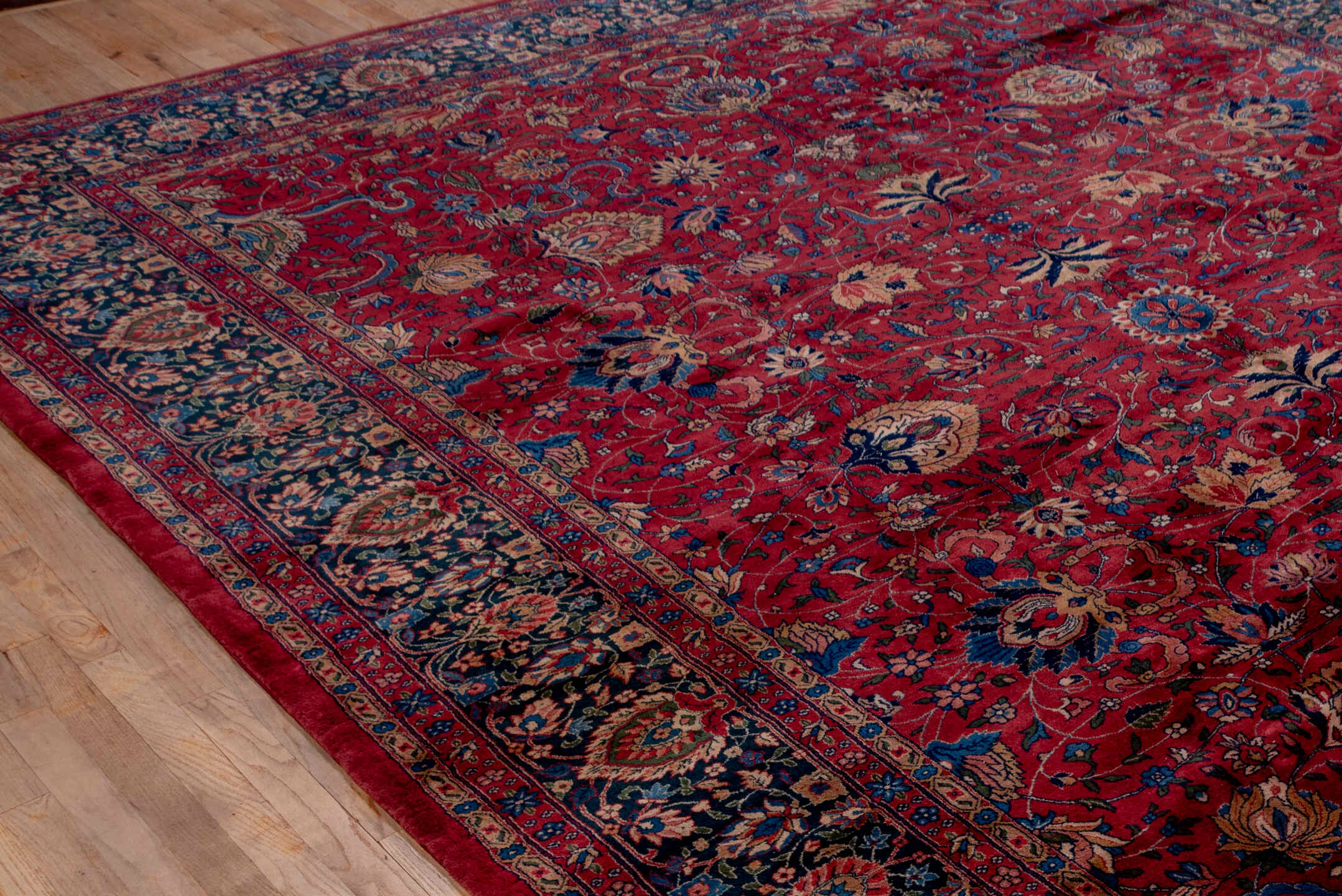 10' x 14' one-of-a-kind handmade antique Lahor large size rug. Color palette: red, navy, ivory, blue, rust, camel, rose