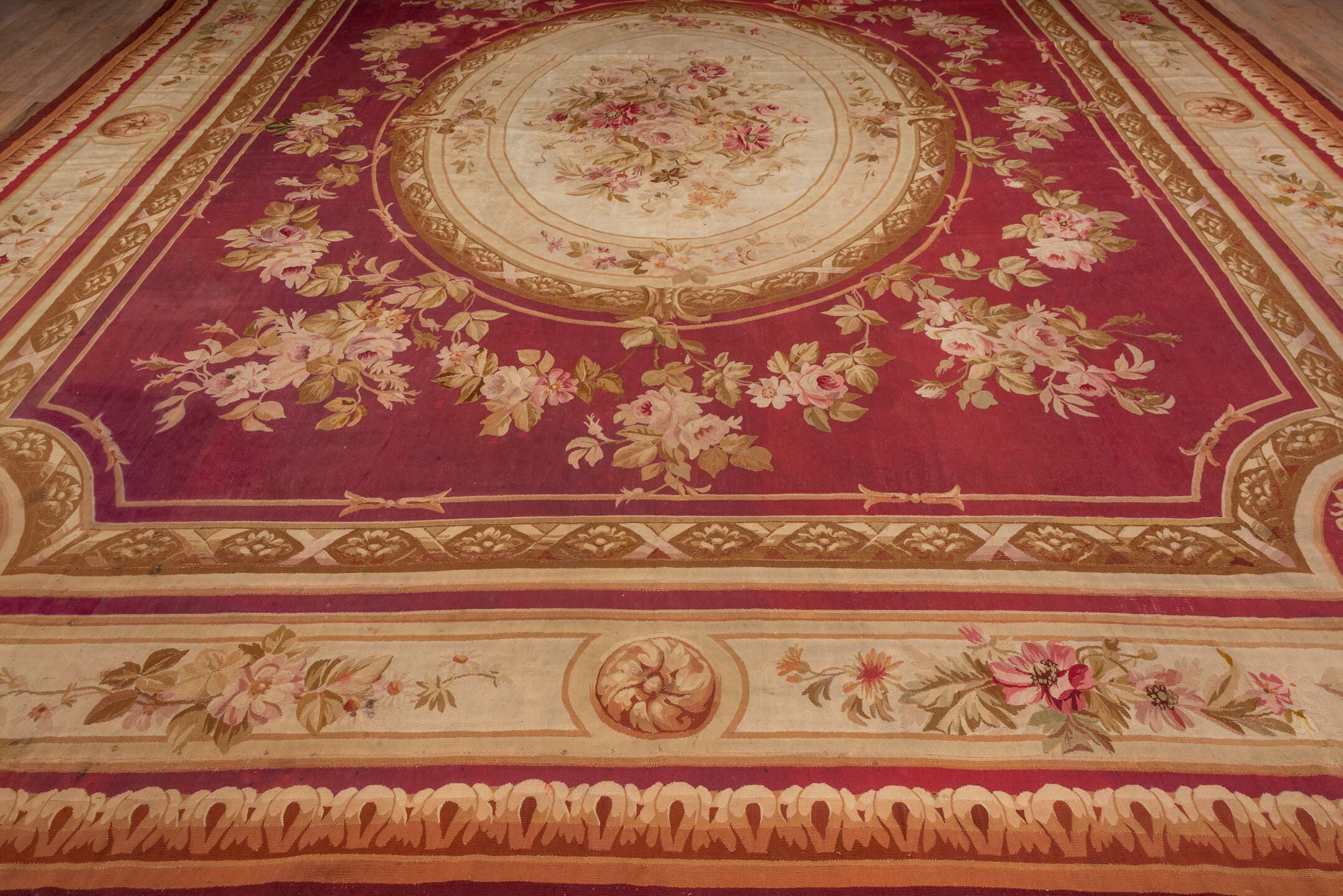 14' x 18' one-of-a-kind handmade vintage Aubusson oversize rug. Color palette: rose, ivory, taupe, sage, gold, blush