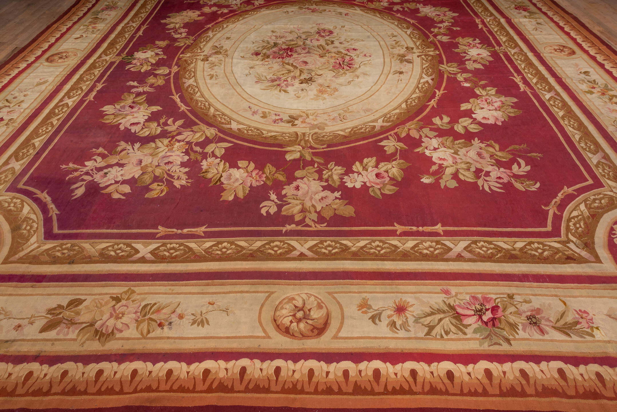 14' x 18' one-of-a-kind handmade vintage Aubusson oversize rug. Color palette: rose, ivory, taupe, sage, gold, blush
