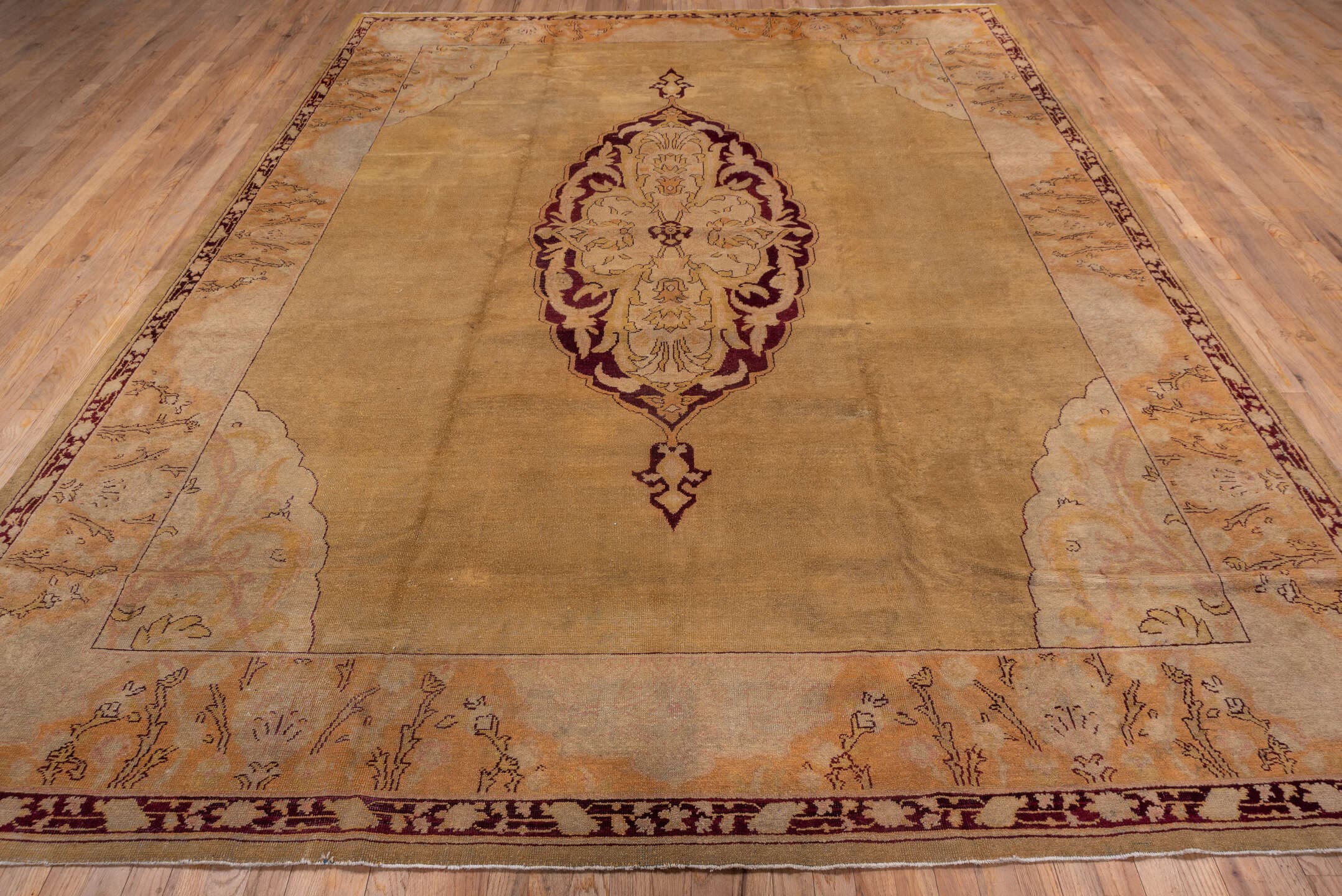 9' x 11' one-of-a-kind handmade vintage Agra large size rug. Color palette: camel, ivory, blush, burgundy, taupe, peach