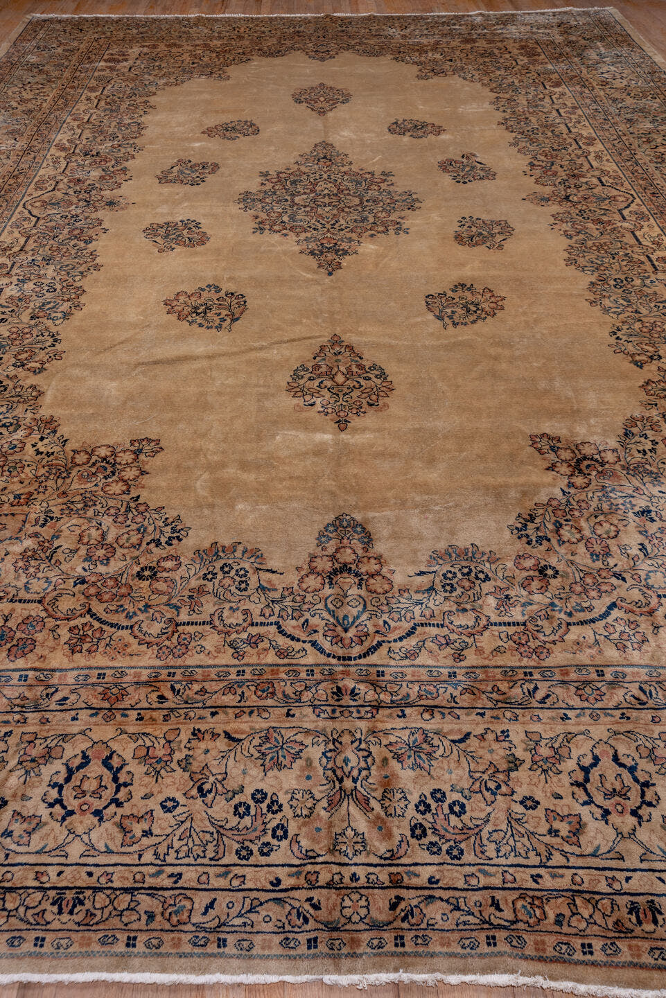 12' x 18' one-of-a-kind handmade antique Sarouk oversize rug. Color palette: beige, ivory, slate, taupe, rust, camel