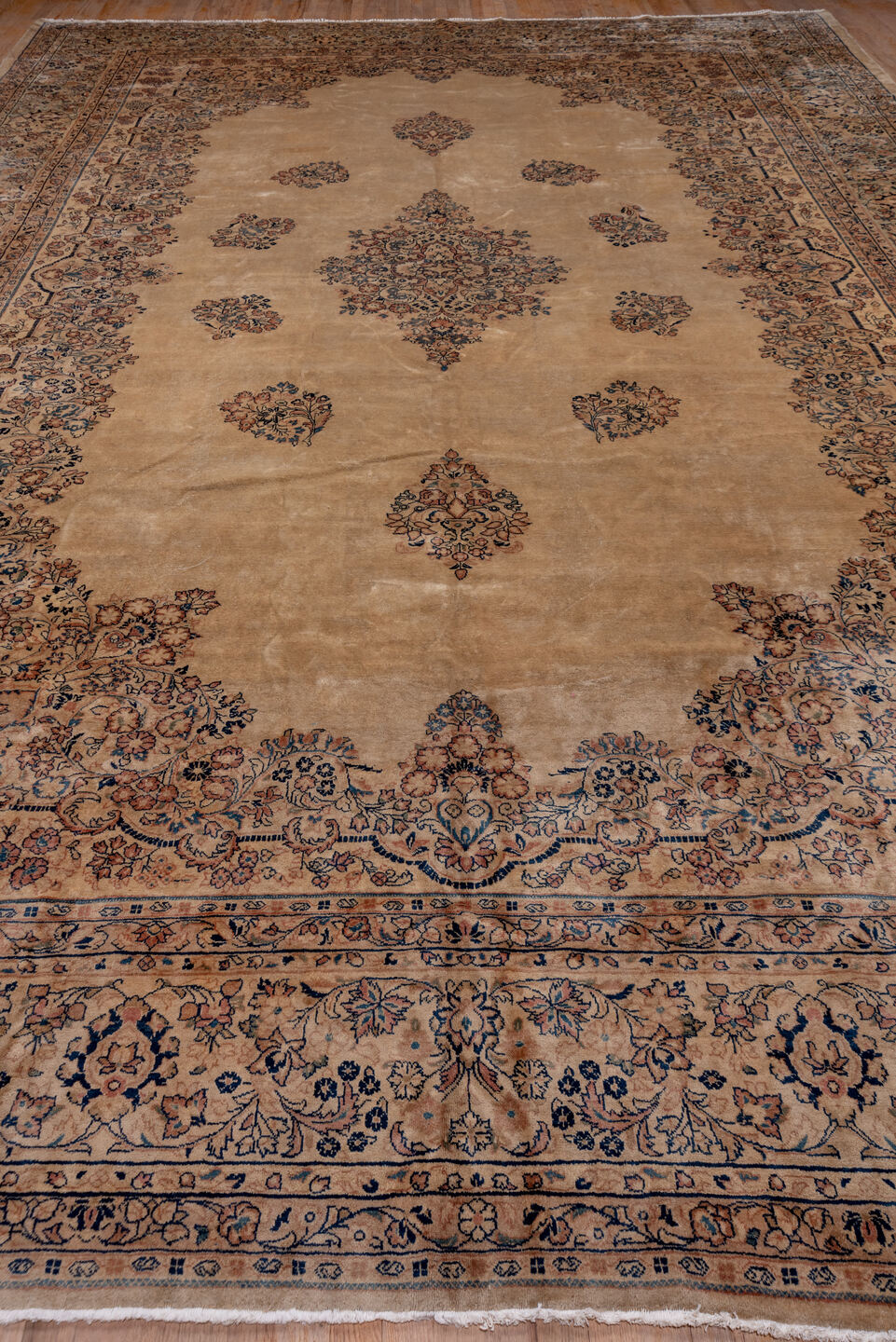 12' x 18' one-of-a-kind handmade antique Sarouk oversize rug. Color palette: beige, ivory, slate, taupe, rust, camel