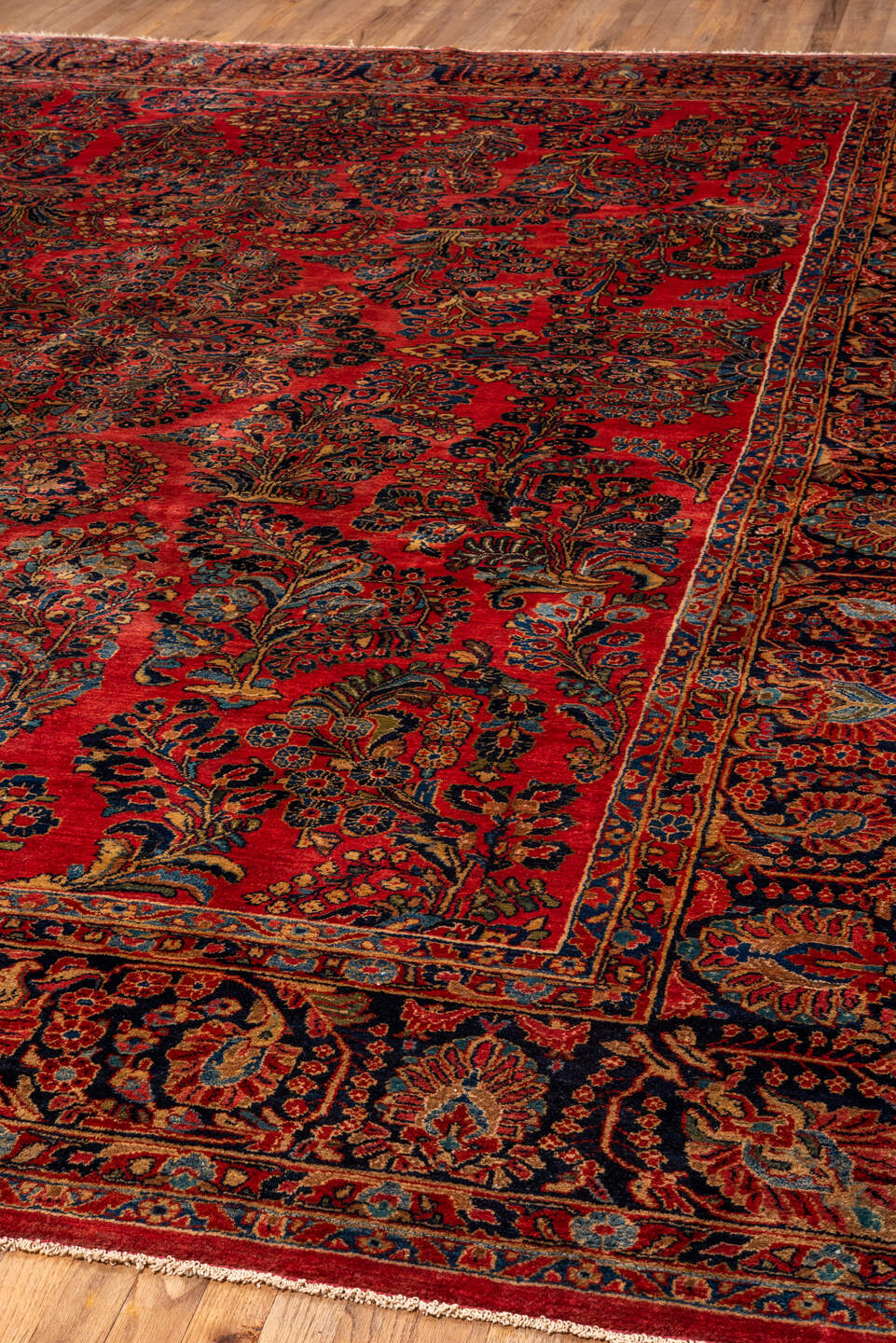 10' x 13' one-of-a-kind handmade antique Sarouk large size rug. Color palette: red, navy, rust, ivory, gold, coral, slate