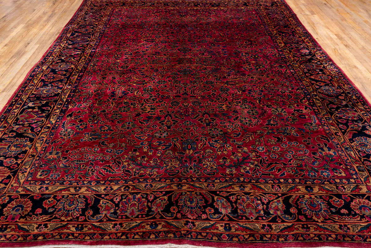 9' x 12' one-of-a-kind handmade antique Sarouk large size rug. Color palette: red, navy, rose, ivory, burgundy, cobalt
