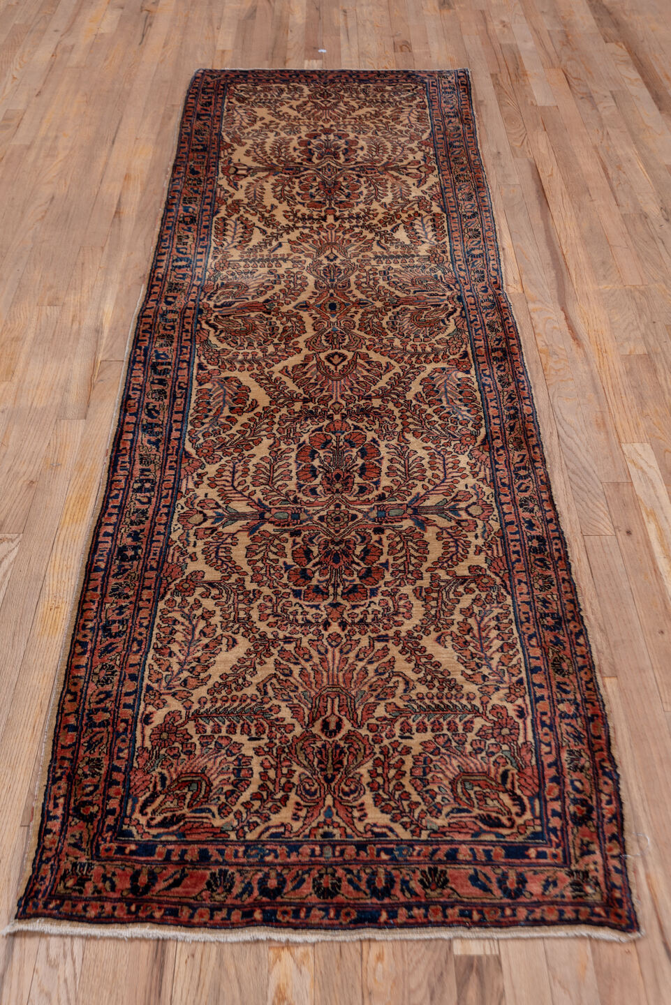 2' x 10' one-of-a-kind handmade antique Sarouk runner rug. Color palette: ivory, navy, rust, camel, burgundy, blue