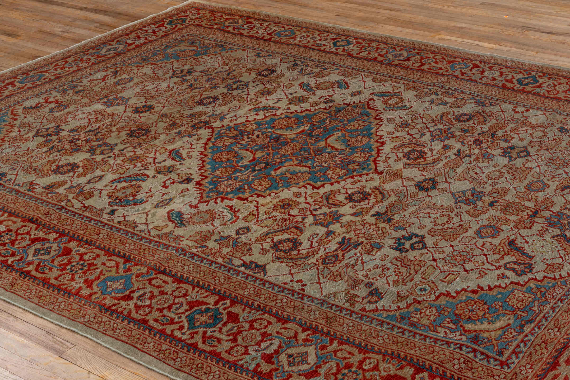 8' x 10' one-of-a-kind handmade antique Sultanabad large size rug. Color palette: ivory, rust, sky_blue, brick, camel