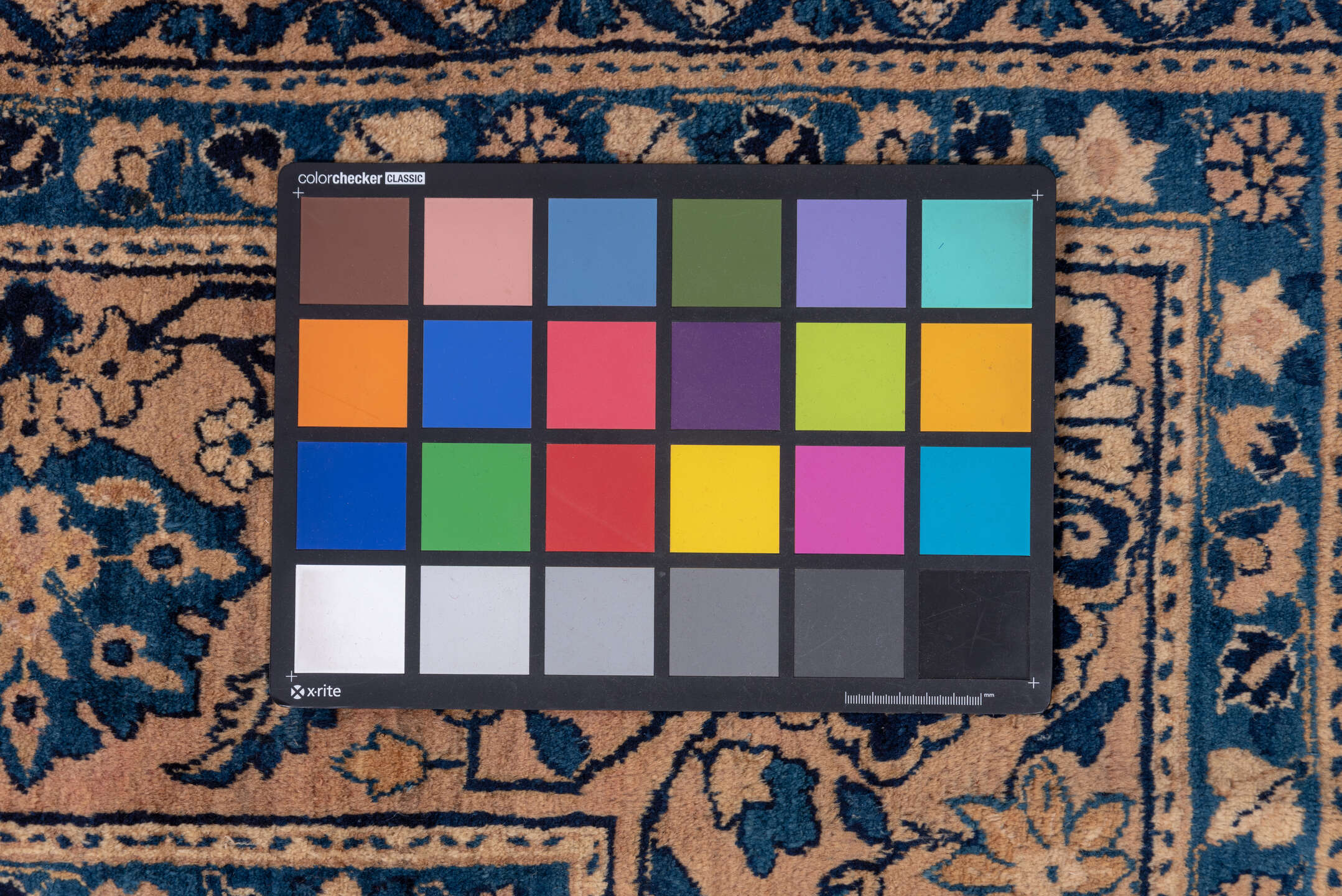 9' x 18' one-of-a-kind handmade antique Kerman rug. Color palette: navy, camel, ivory, slate, taupe, powder_blue, blue