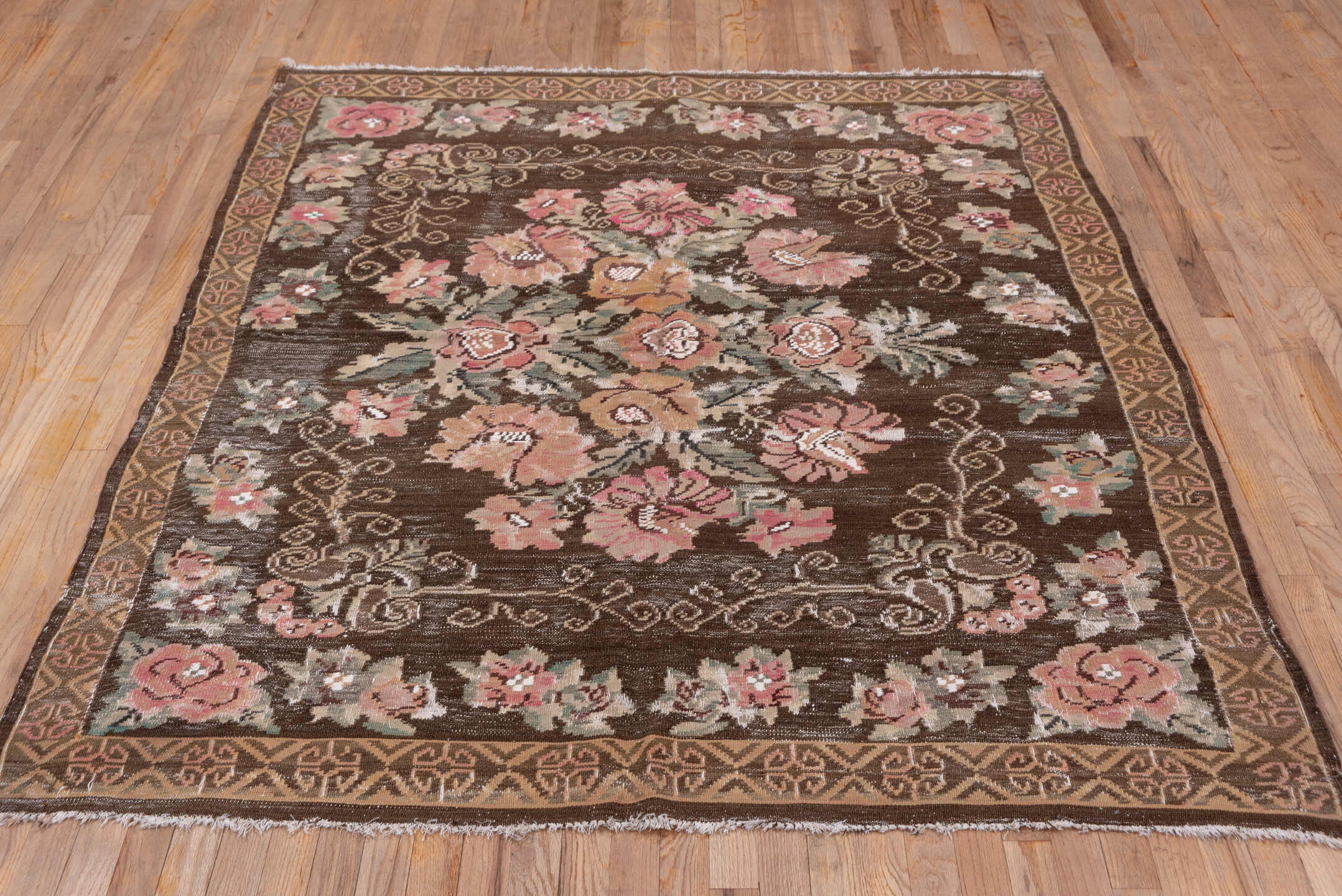 5' x 7' one-of-a-kind handmade antique Kilim rug. Color palette: brown, rose, camel, sage, taupe, ivory, coral, pink, red