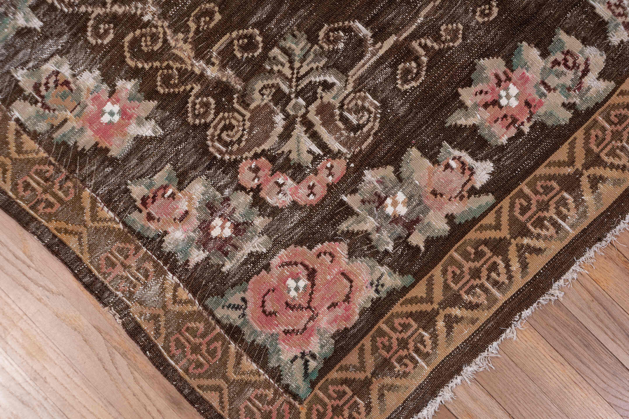 5' x 7' one-of-a-kind handmade antique Kilim rug. Color palette: brown, rose, camel, sage, taupe, ivory, coral, pink, red