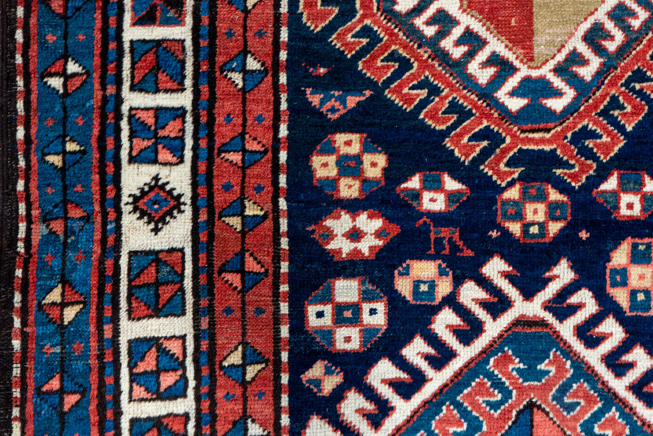 3' x 11' one-of-a-kind handmade antique NW Persian runner rug. Color palette: navy, ivory, rust, indigo, rose, sky_blue