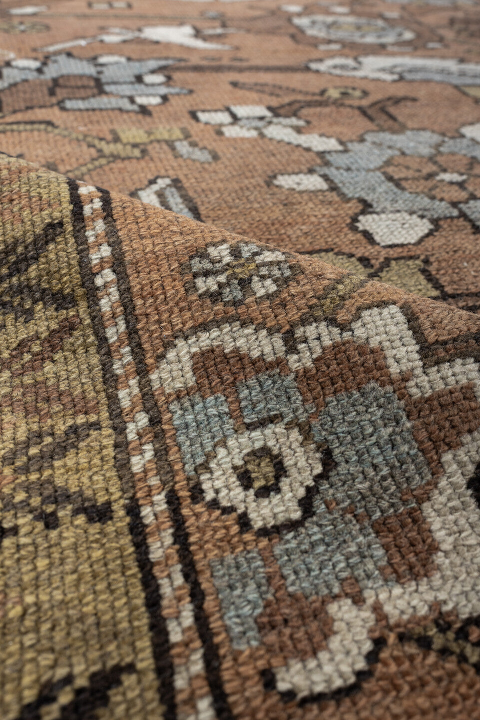 3' x 6' one-of-a-kind handmade antique Kurd rug. Color palette: terra cotta, ivory, sage, slate, camel, charcoal, taupe