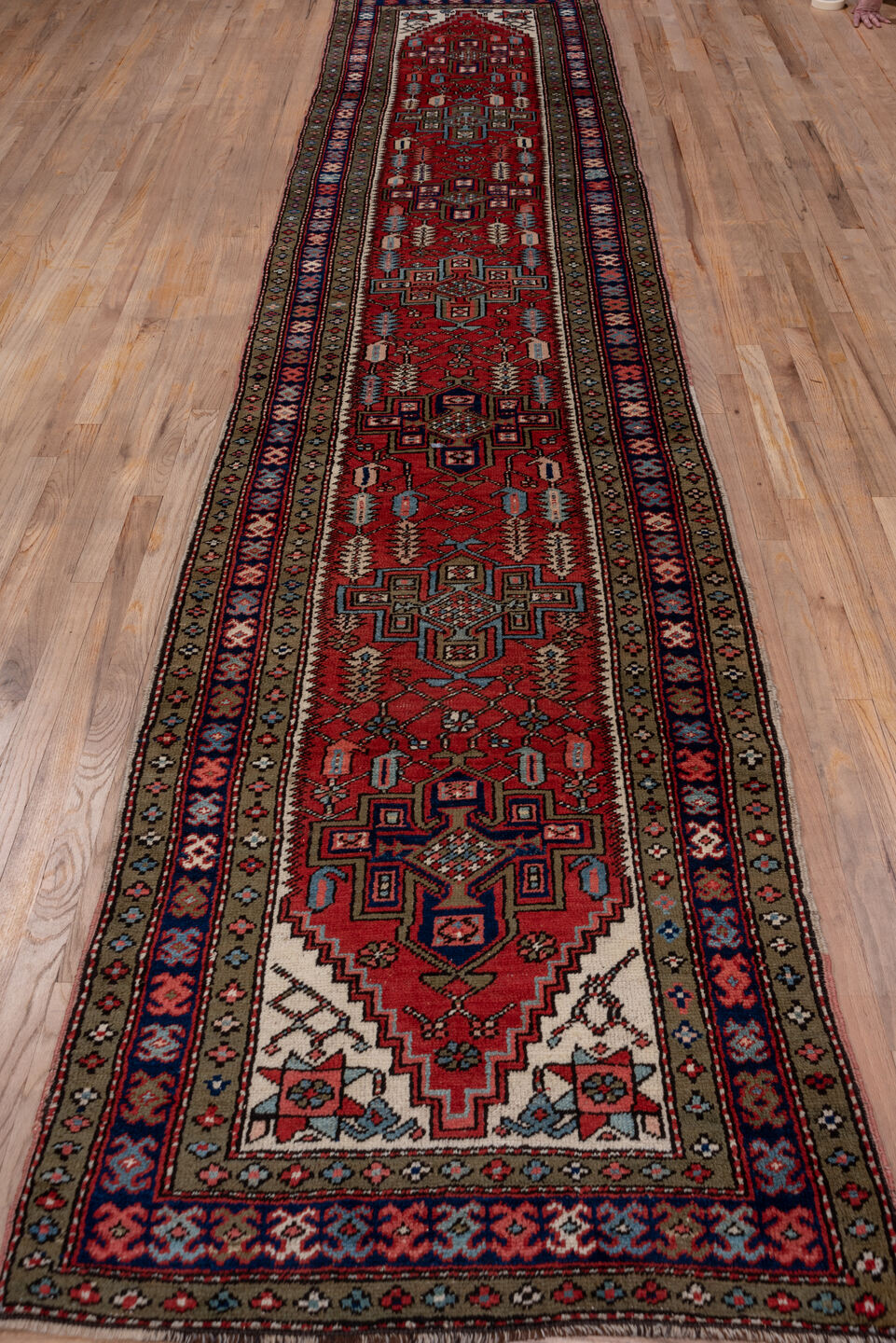 3' x 14' one-of-a-kind handmade antique Heriz runner rug. Color palette: rust, navy, ivory, taupe, slate, rose, charcoal