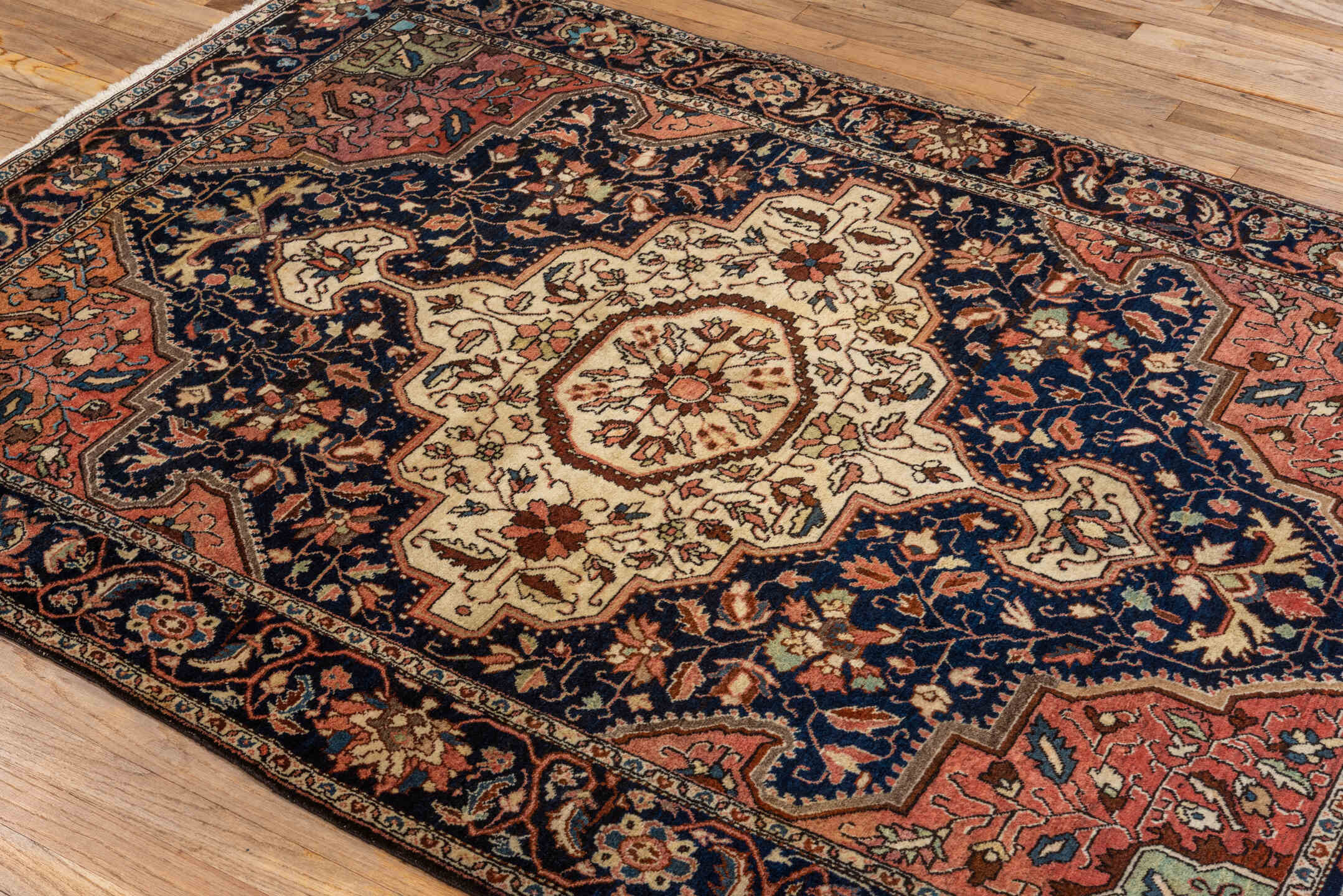 4' x 6' one-of-a-kind handmade antique Malysarouk small size rug. Color palette: navy, ivory, rust, rose, sky_blue, camel