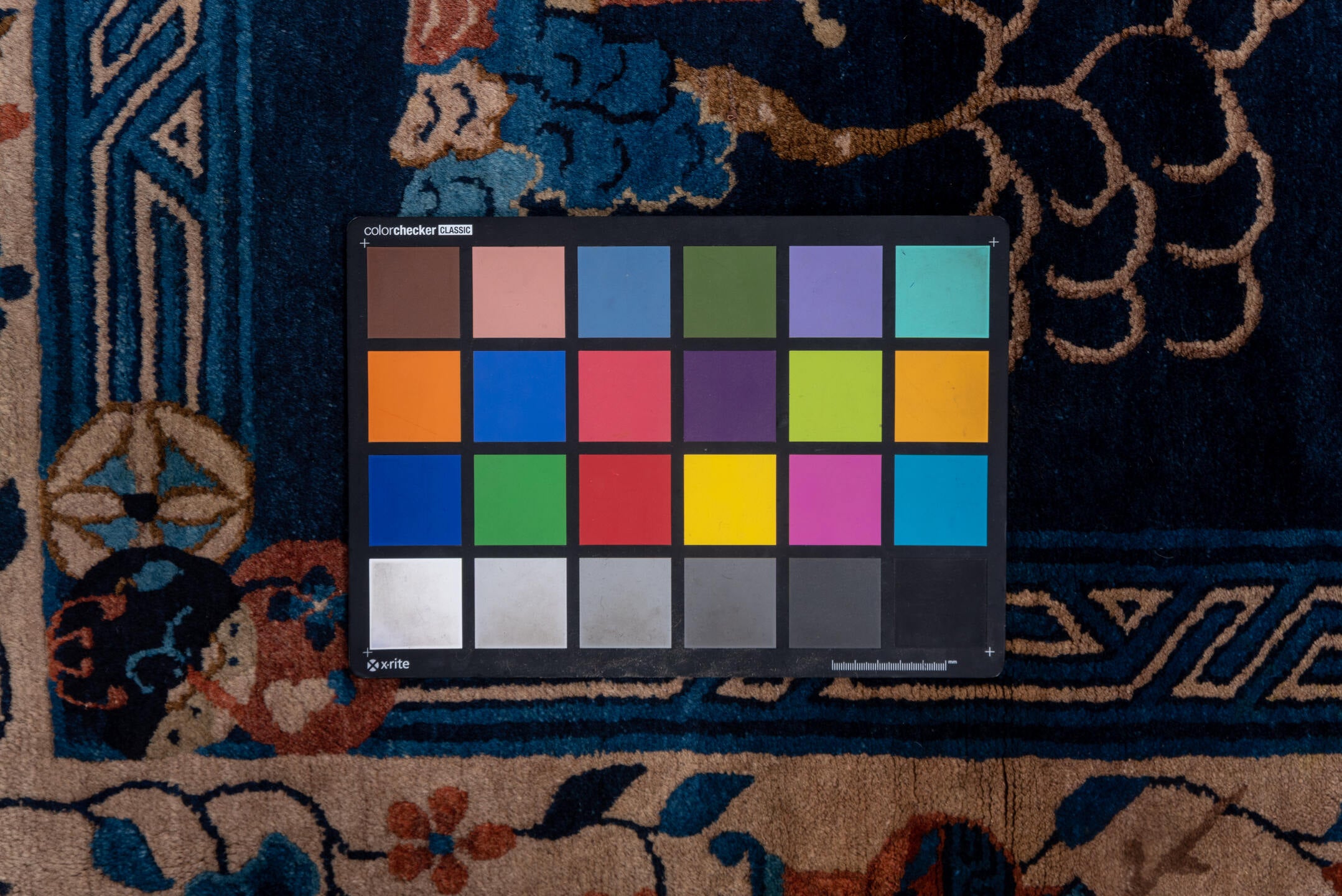 6' x 8' one-of-a-kind handmade vintage Chinese medium size rug. Color palette: black, blue, brown, gray, off-white, pink