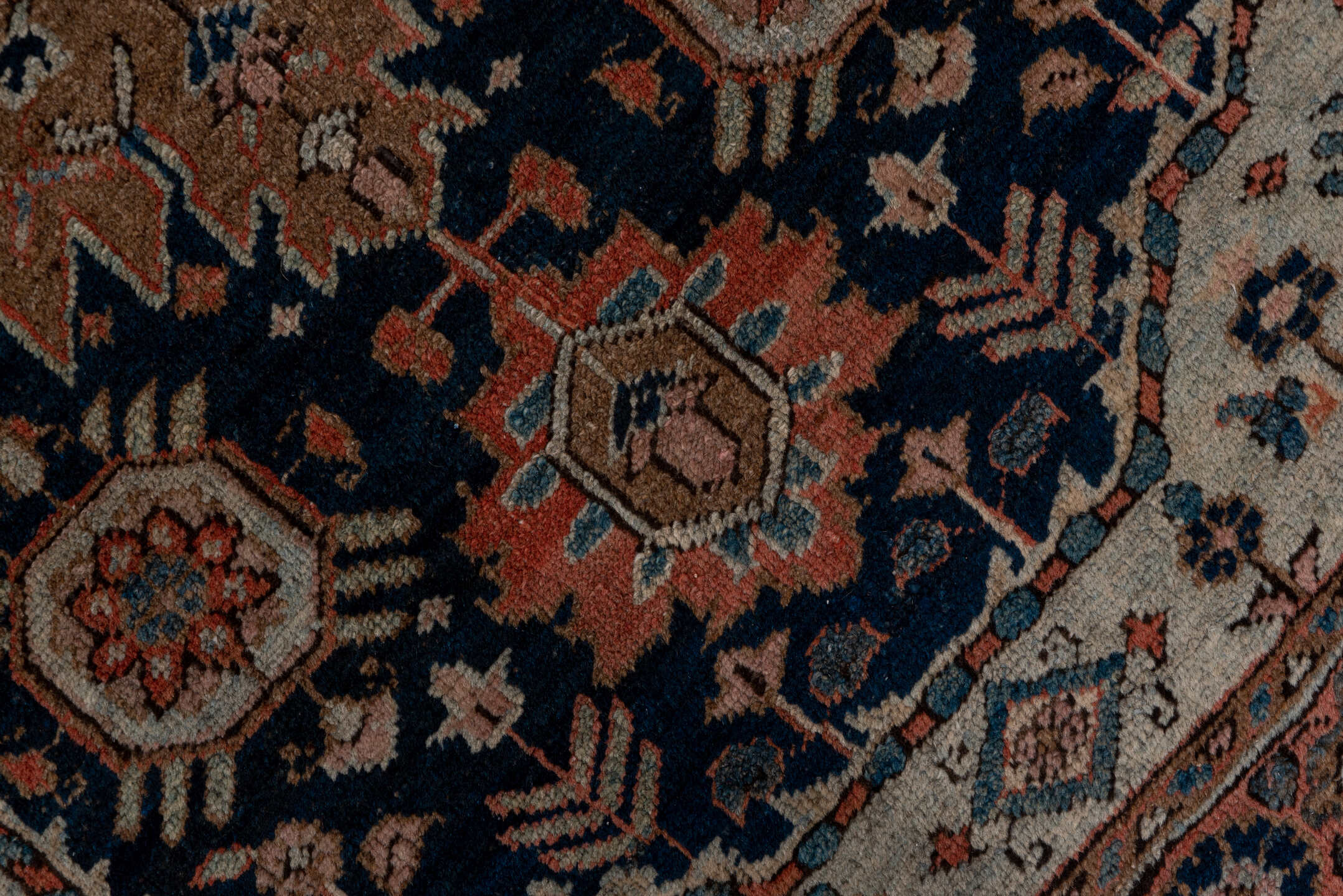 3' x 5' one-of-a-kind handmade antique Heriz small size rug. Color palette: navy, rust, ivory, taupe, slate, camel, rose