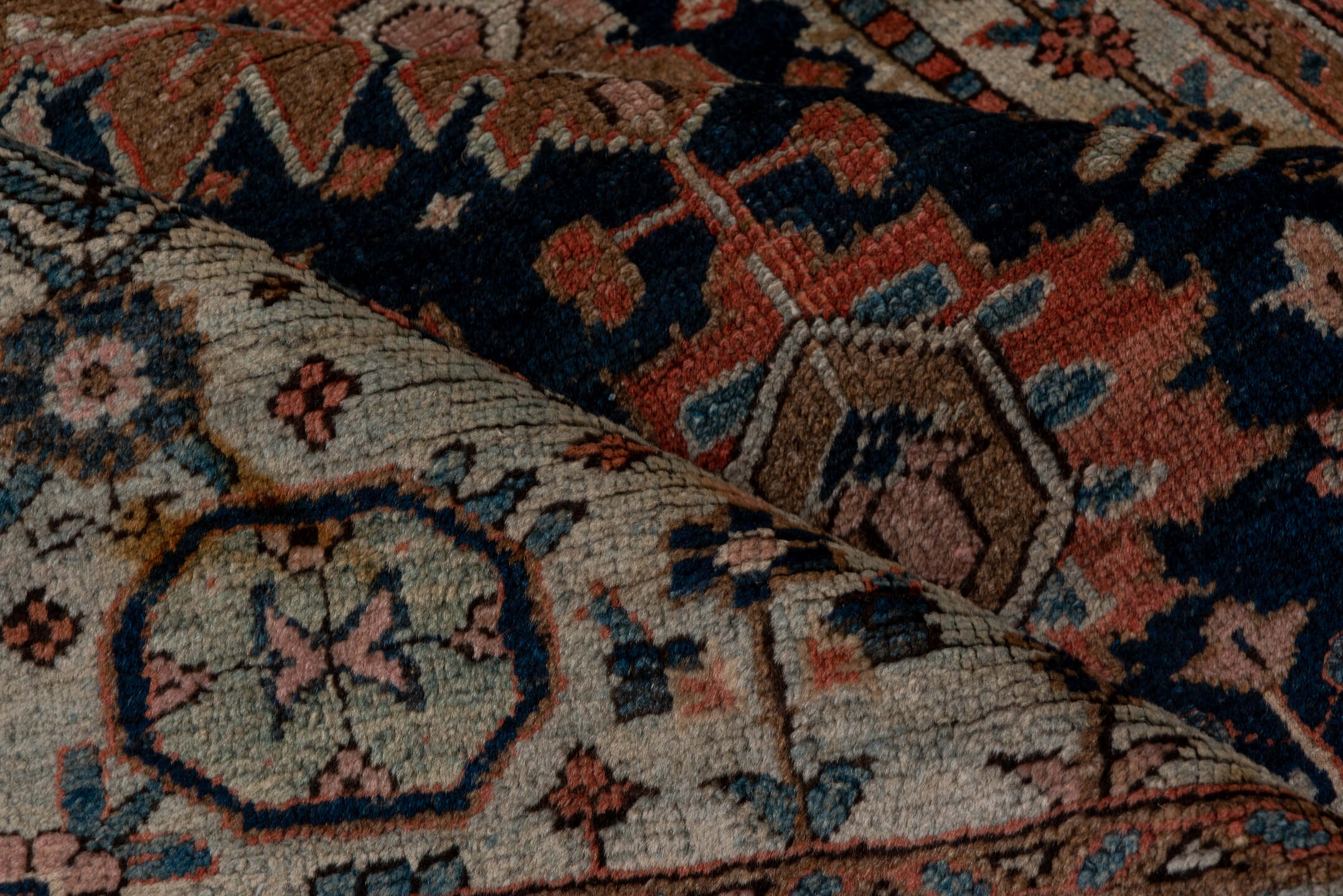 3' x 5' one-of-a-kind handmade antique Heriz small size rug. Color palette: navy, rust, ivory, taupe, slate, camel, rose