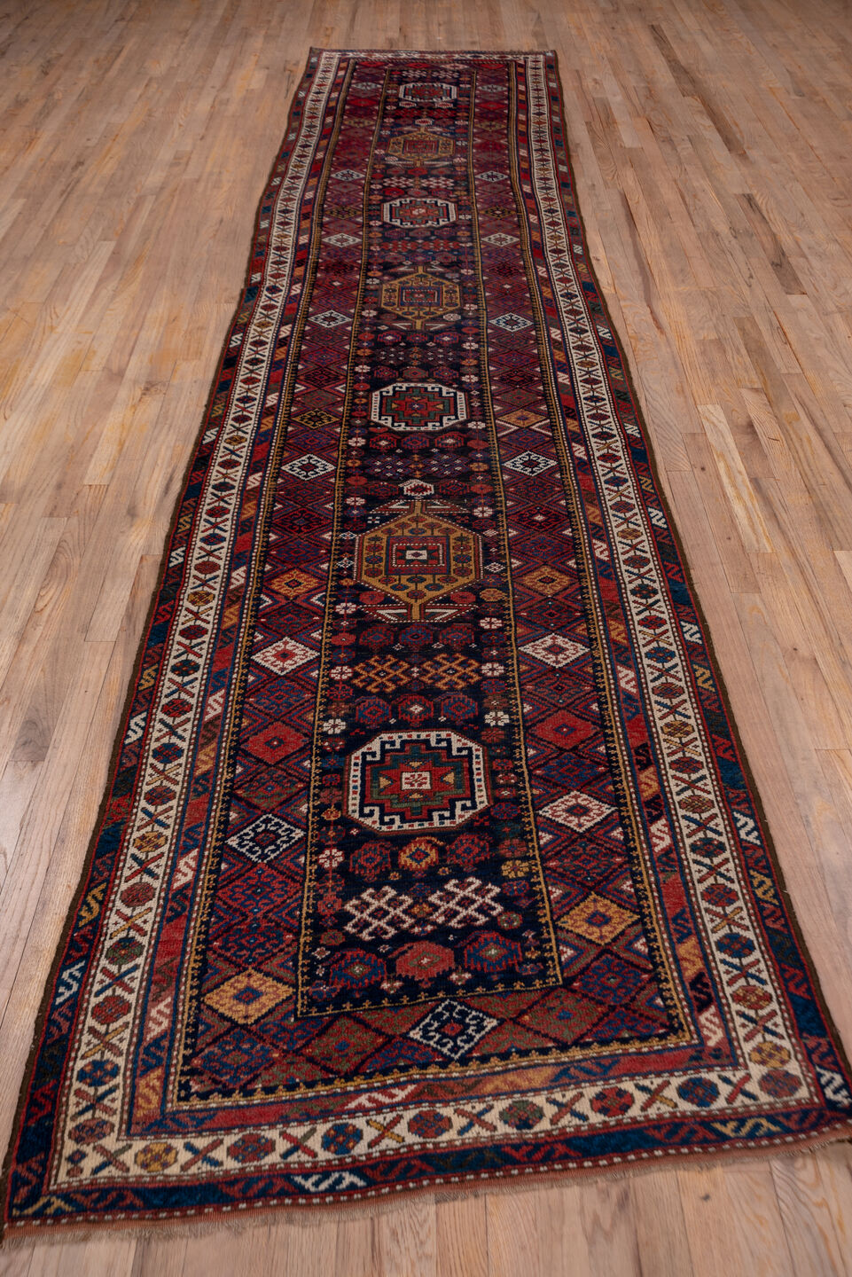 3' x 15' one-of-a-kind handmade vintage Kurd runner rug. Color palette: black, blue, brown, charcoal, dim gray, gray