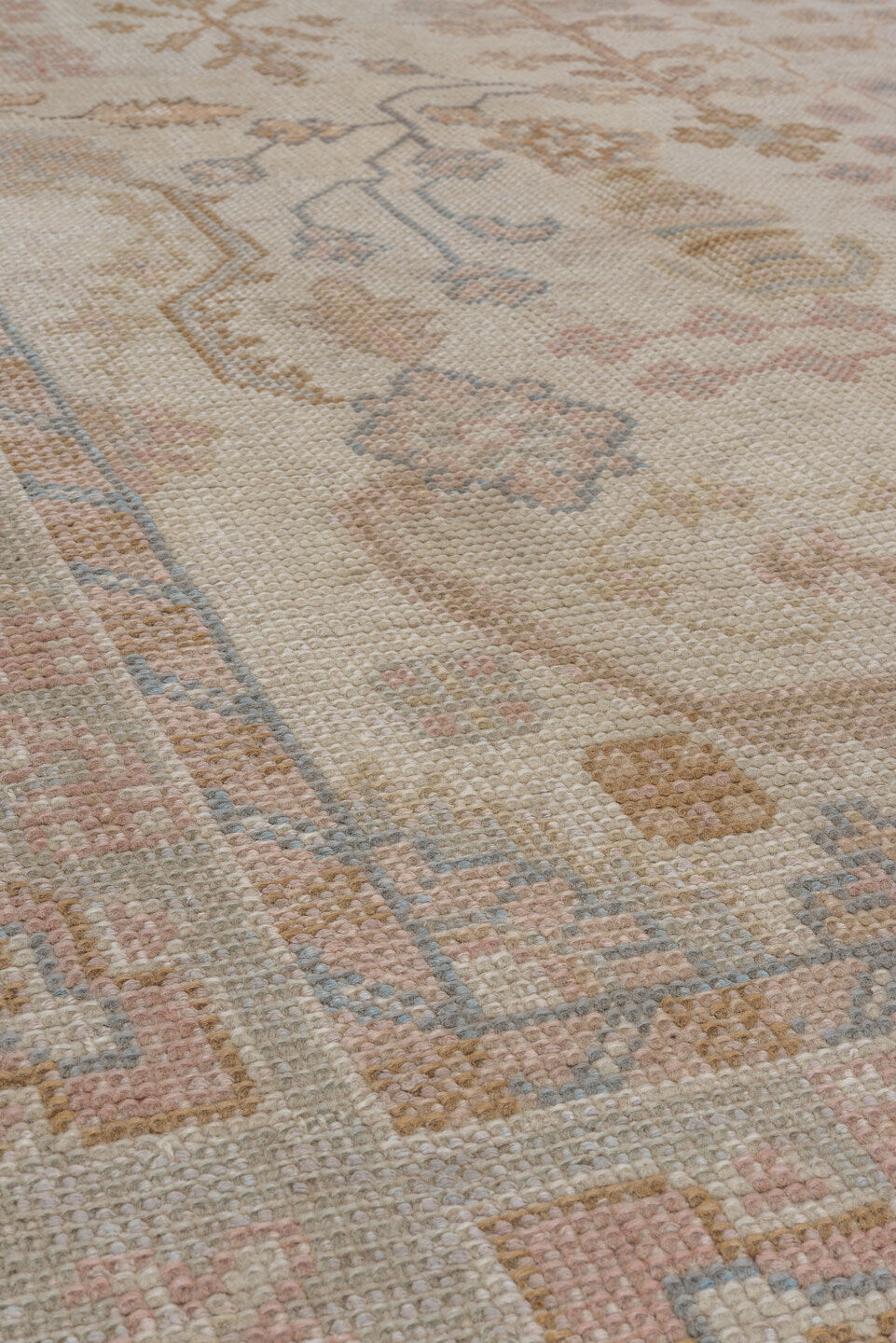 6' x 9' one-of-a-kind handmade antique Oushak medium size rug. Color palette: ivory, blush, taupe, sage, gold, rose, camel
