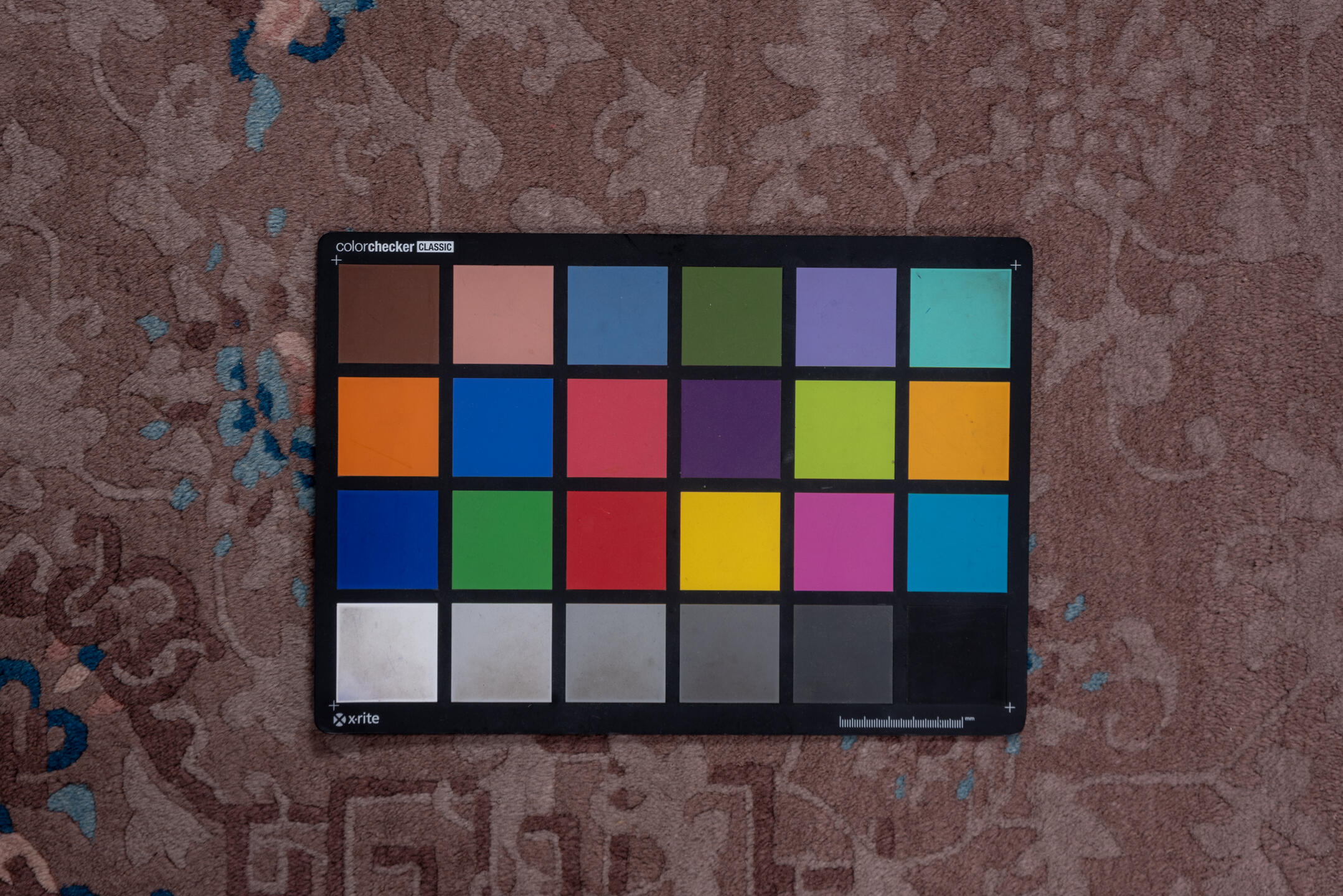 5' x 8' one-of-a-kind handmade vintage Chinese medium size rug. Color palette: blue, brown, gray, pink, red, rosy brown