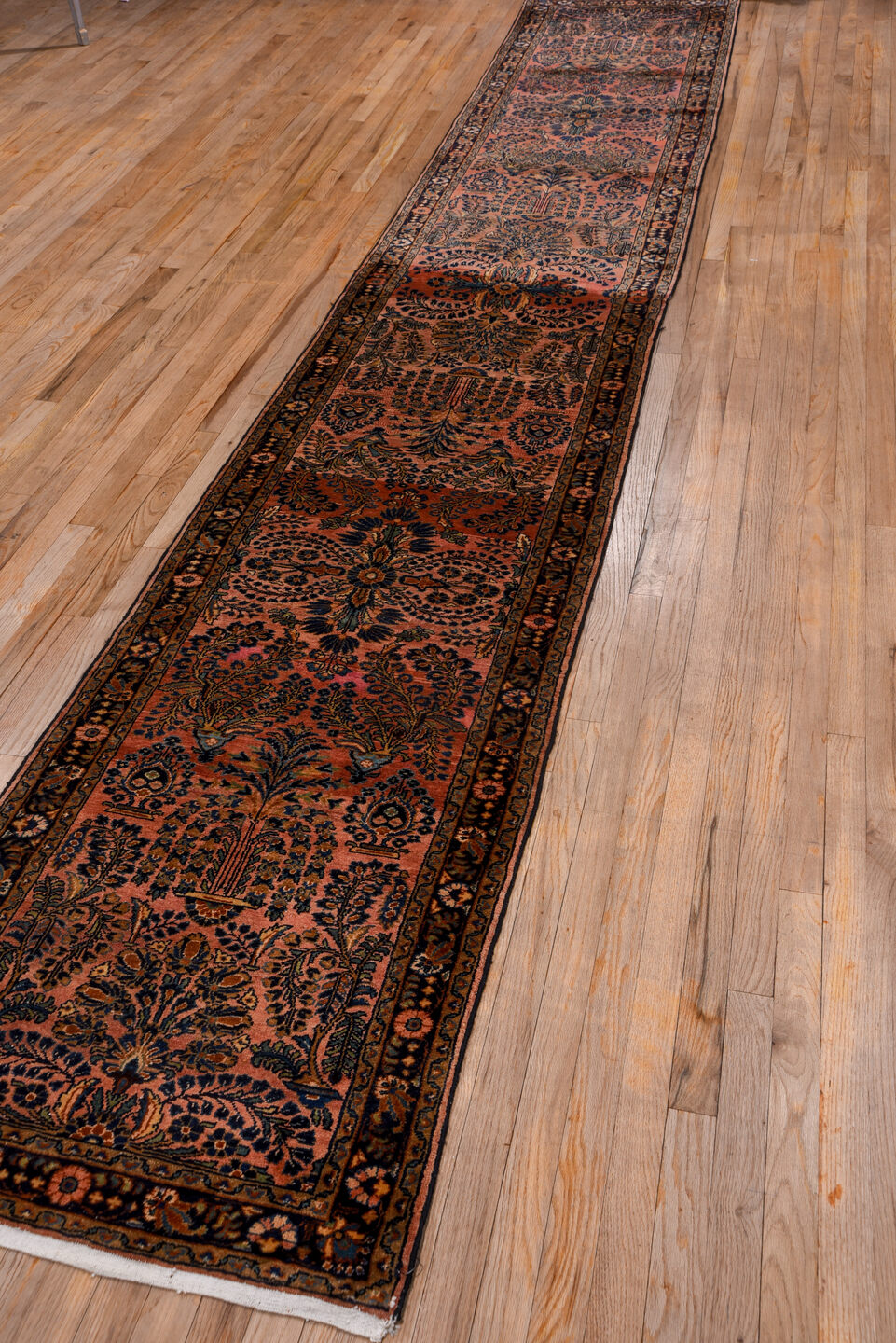 2' x 16' one-of-a-kind handmade vintage Lilian runner rug. Color palette: brown, gray, off-white, pink, red, redwood, snow