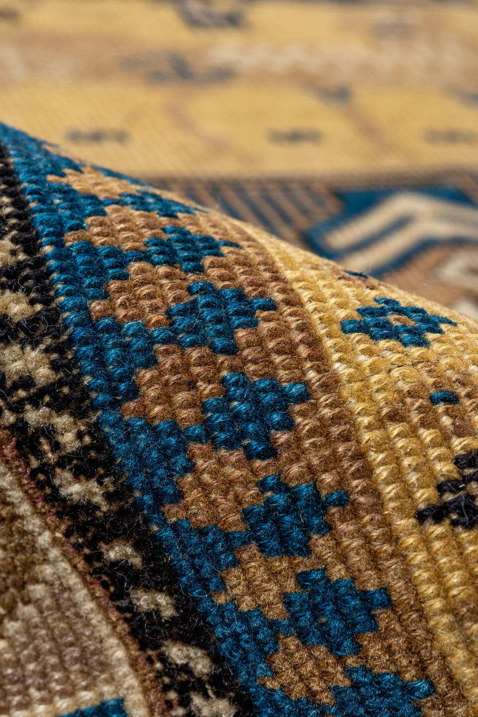 4' x 5' one-of-a-kind handmade antique Cabistan small size rug. Color palette: camel, brown, navy, ivory, taupe, charcoal