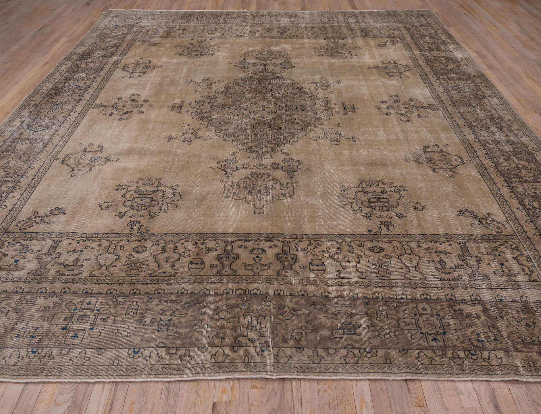 10' x 13' one-of-a-kind handmade antique Sparta large size rug. Color palette: camel, taupe, brown, slate, ivory, charcoal