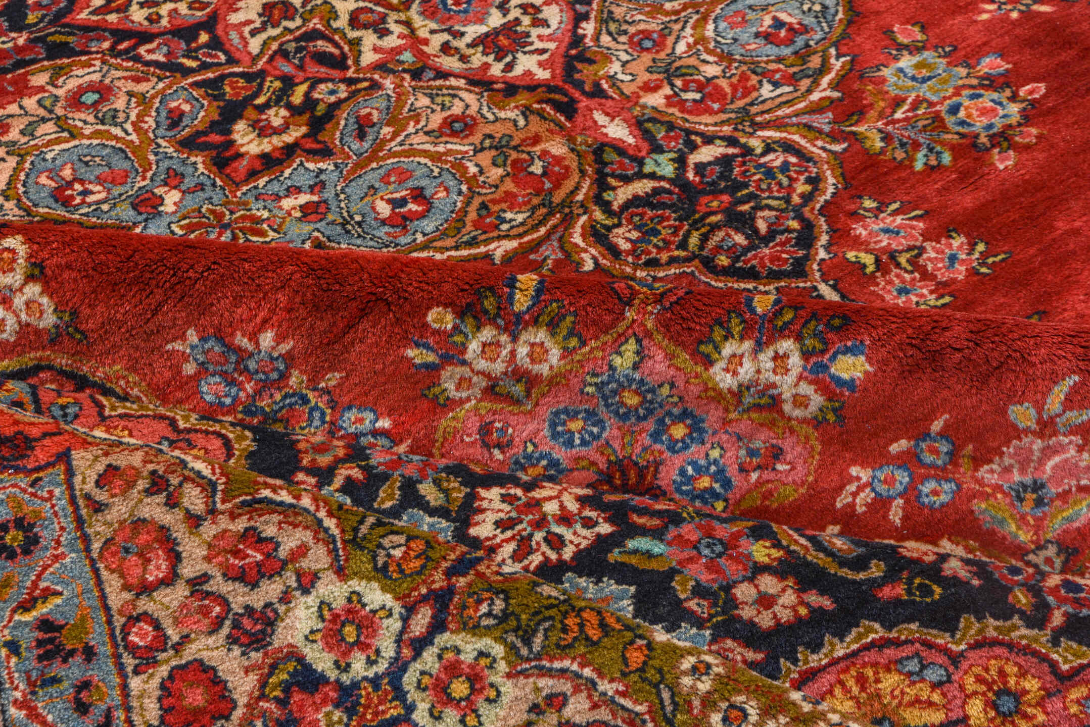 10' x 13' one-of-a-kind handmade antique Sarouk large size rug. Color palette: red, navy, ivory, sky blue, rose, gold, camel