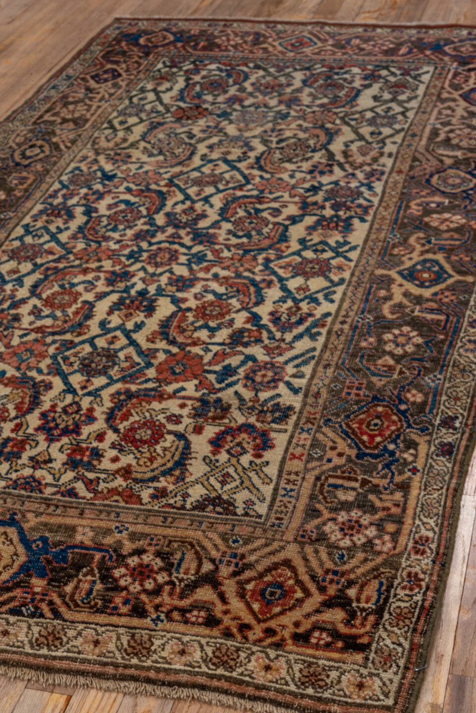 4' x 7' one-of-a-kind handmade antique Bidjar rug. Color palette: ivory, indigo, taupe, rust, rose, camel, charcoal, purple