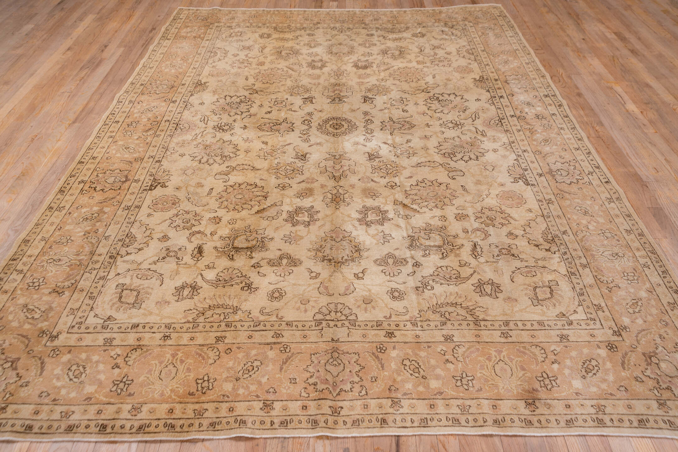 7' x 10' one-of-a-kind handmade antique Tabriz large size rug. Color palette: ivory, blush, taupe, camel, rose, beige, brown