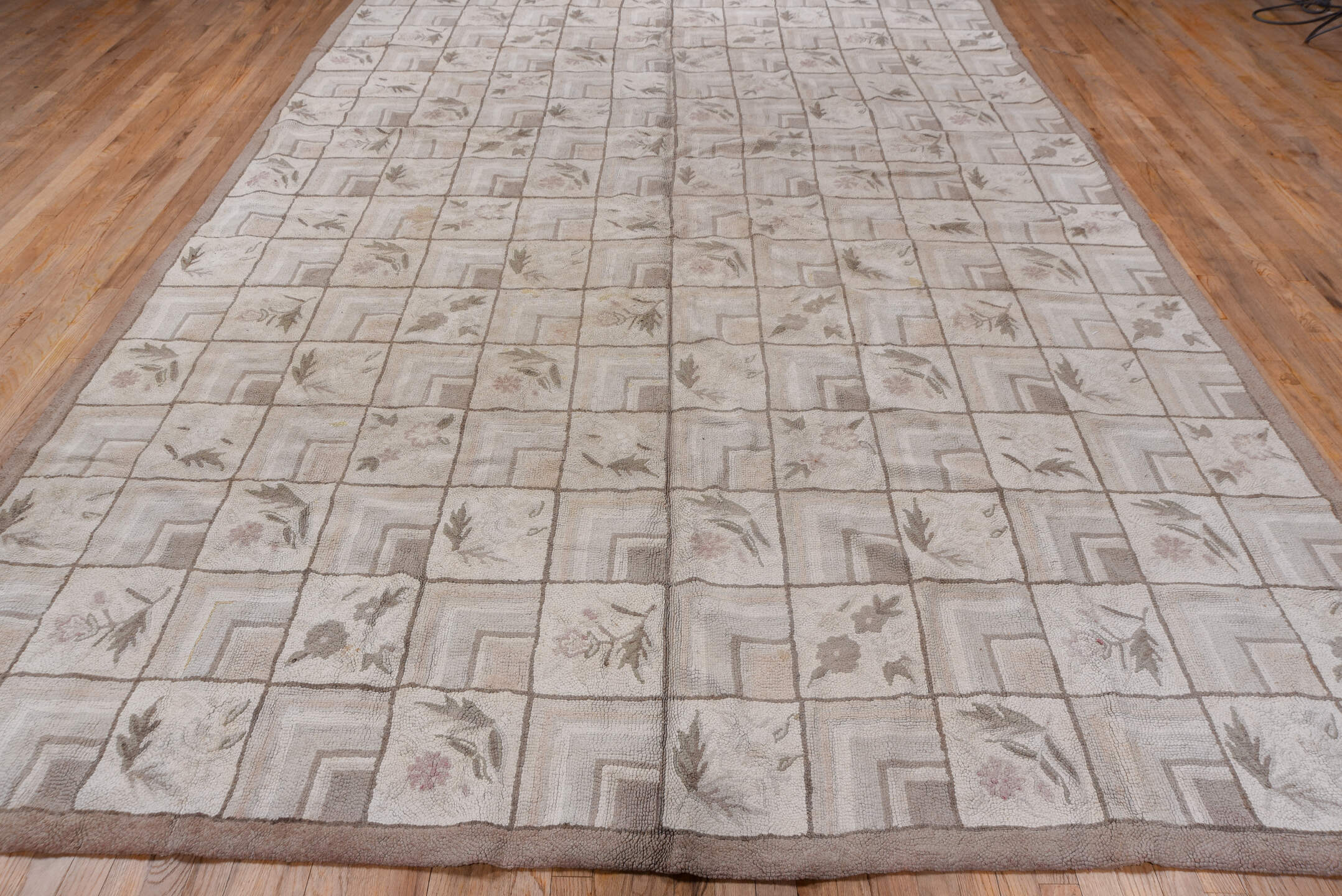 9' x 13' one-of-a-kind handmade vintage Hooked large size rug. Color palette: brown, gray, light gray, off-white, pink