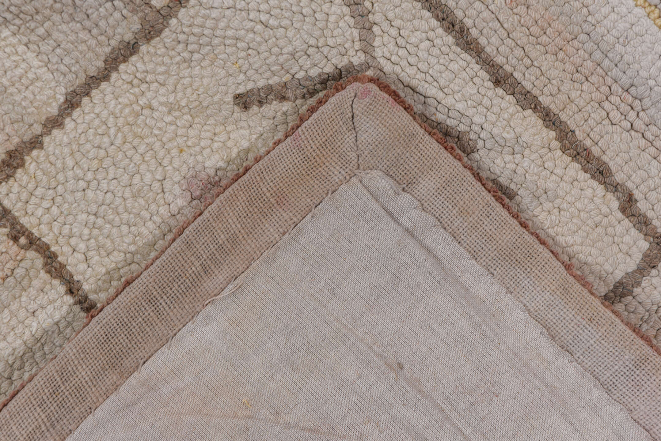 9' x 13' one-of-a-kind handmade vintage Hooked large size rug. Color palette: brown, gray, light gray, off-white, pink