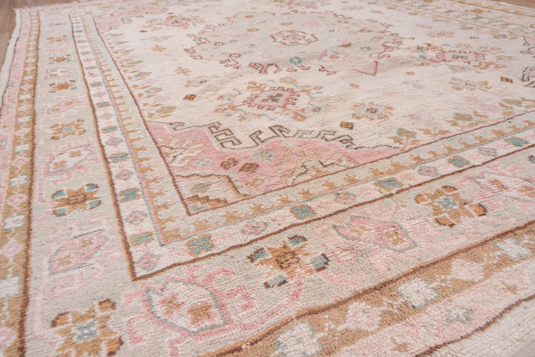 7' x 10' one-of-a-kind handmade antique Oushak large size rug. Color palette: blush, ivory, taupe, camel, sage, gold, rose