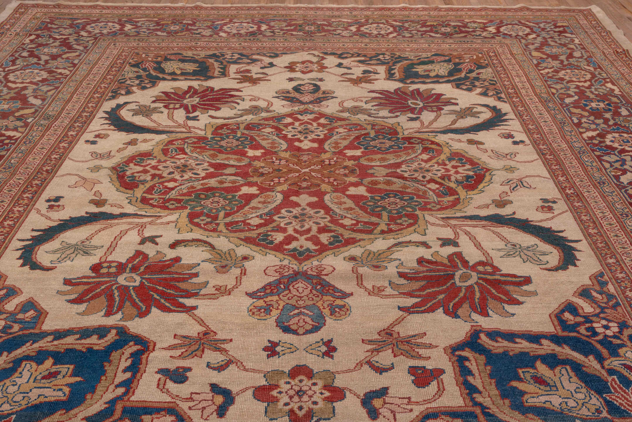 12' x 14' one-of-a-kind handmade antique Sultanabad oversize rug. Color palette: ivory, rust, brick red, indigo, soft blue