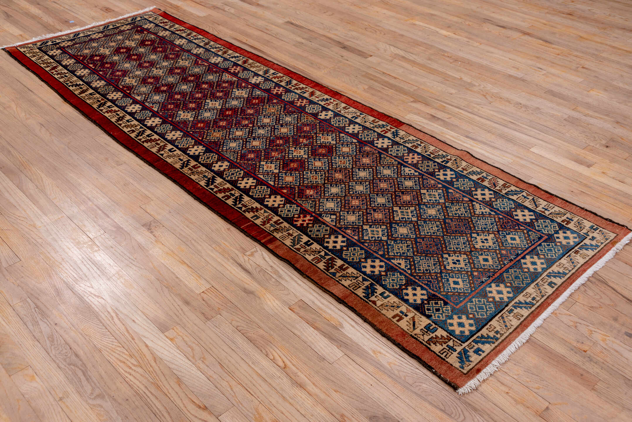 3' x 10' one-of-a-kind handmade vintage Malayer runner rug. Color palette: blue, brown, fiord, gray, orange, pink, red
