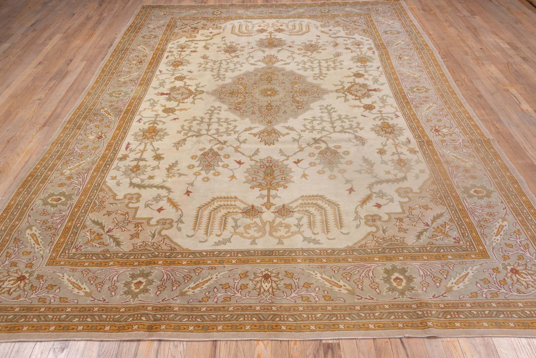8' x 11' one-of-a-kind handmade antique Oushak large size rug. Color palette: ivory, taupe, gold, blush, sage, camel, rose