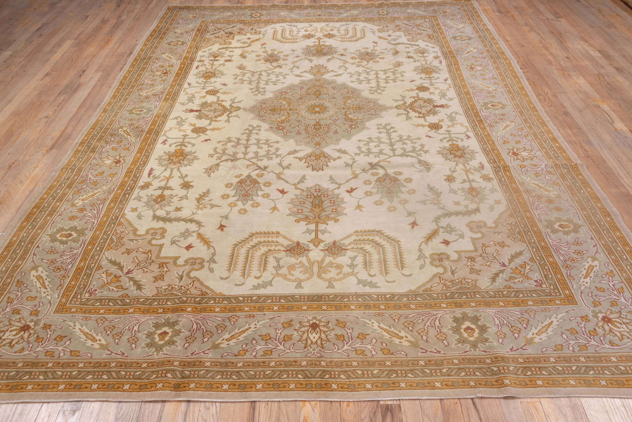 8' x 11' one-of-a-kind handmade antique Oushak large size rug. Color palette: ivory, taupe, gold, blush, sage, camel, rose