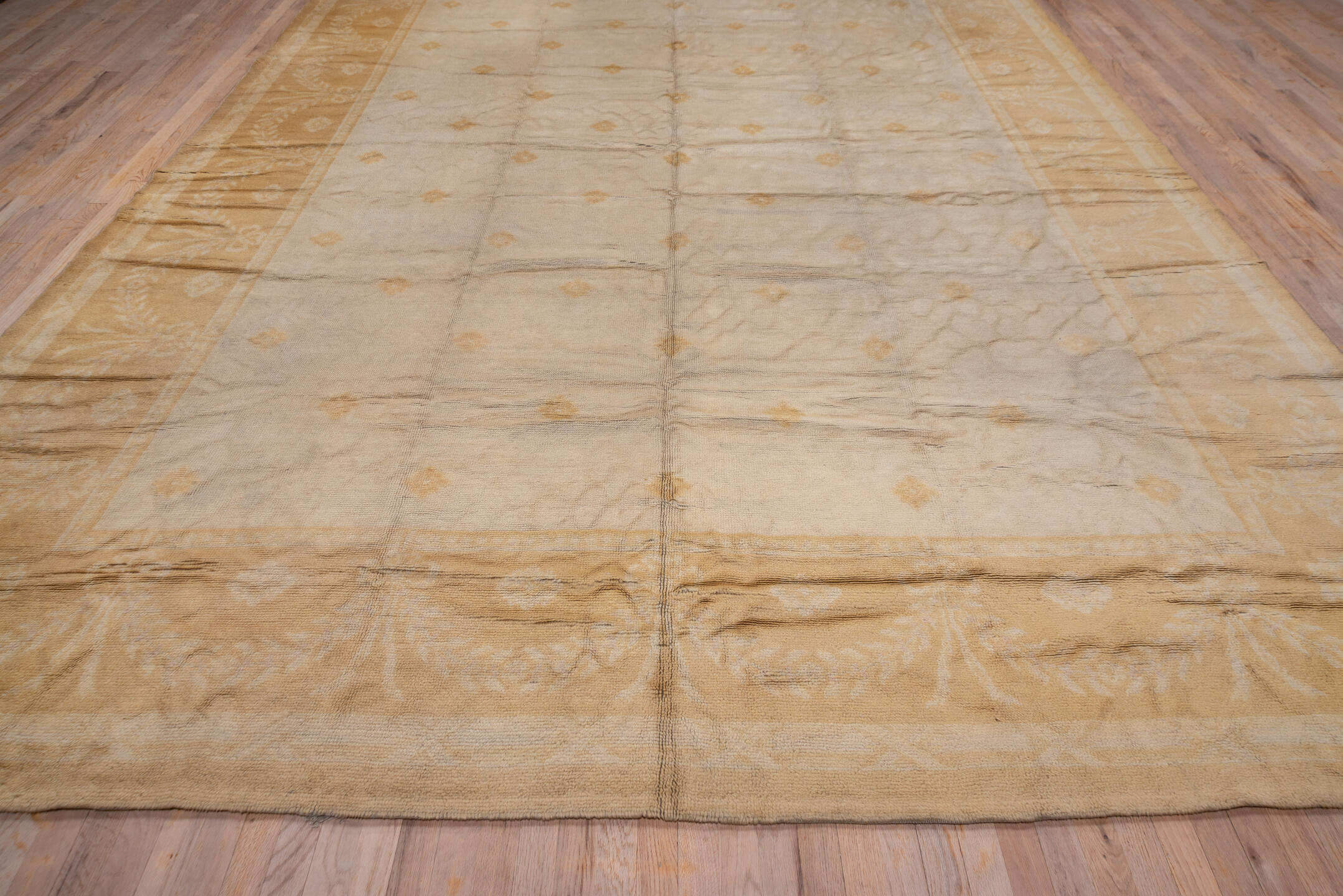 10' x 17' one-of-a-kind handmade vintage Savonnerie rug. Color palette: brown, gray, off-white, orange, pink, tan